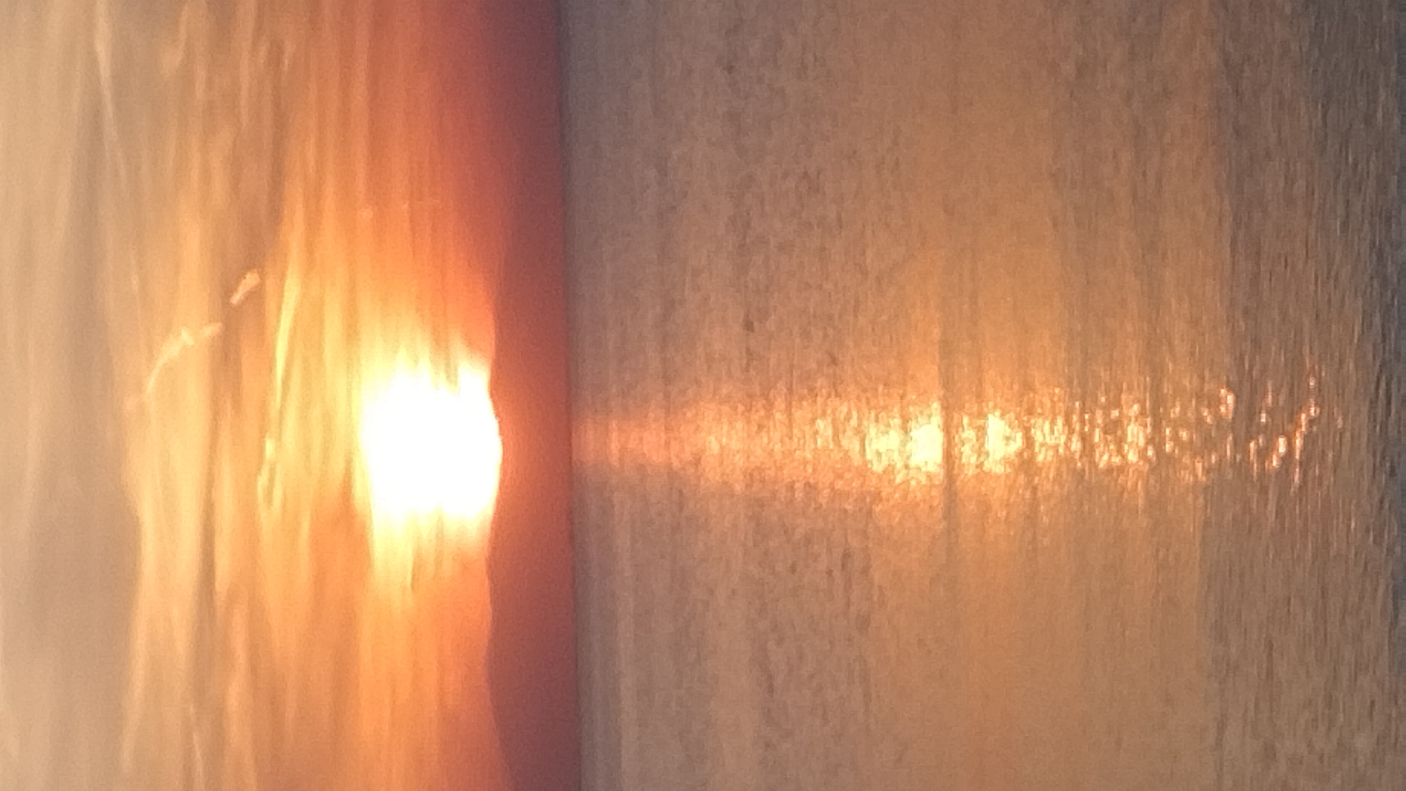 Sunset documented by beachgoers in Perea, Greece June 6