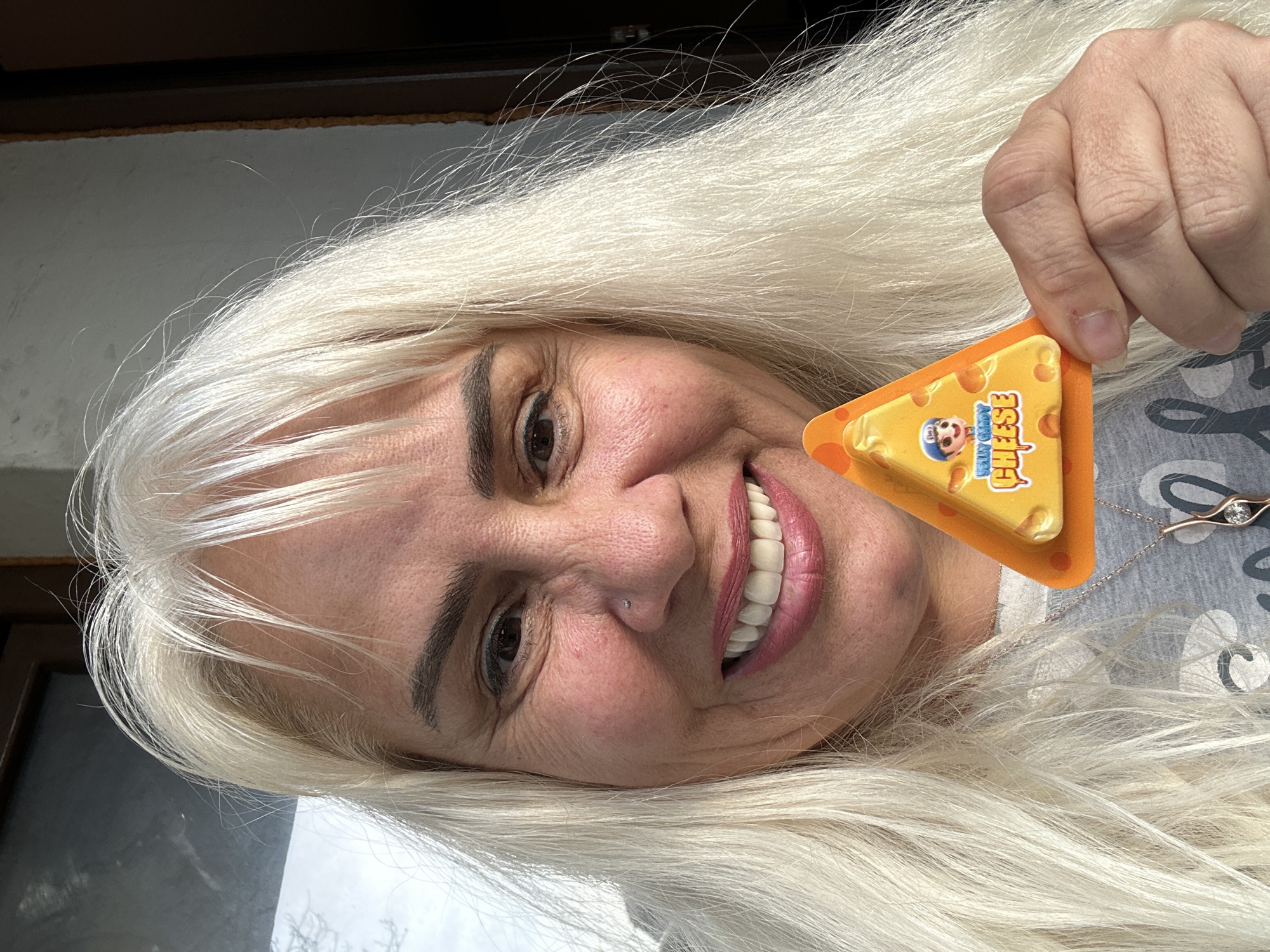 Woman poses with novelty snacks in Sofia selfie session