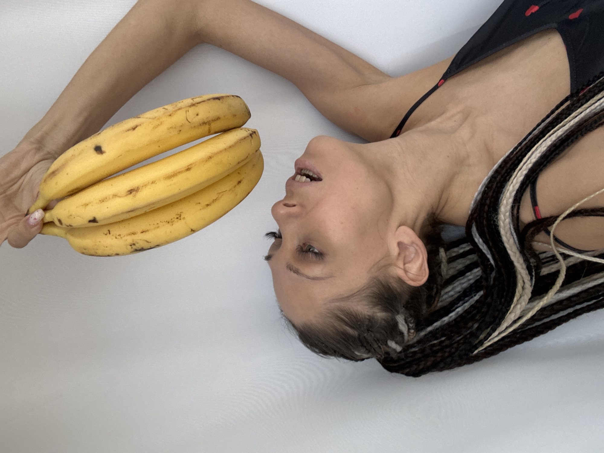 Woman in heart-patterned top photographed in staged poses near Yaroslavl