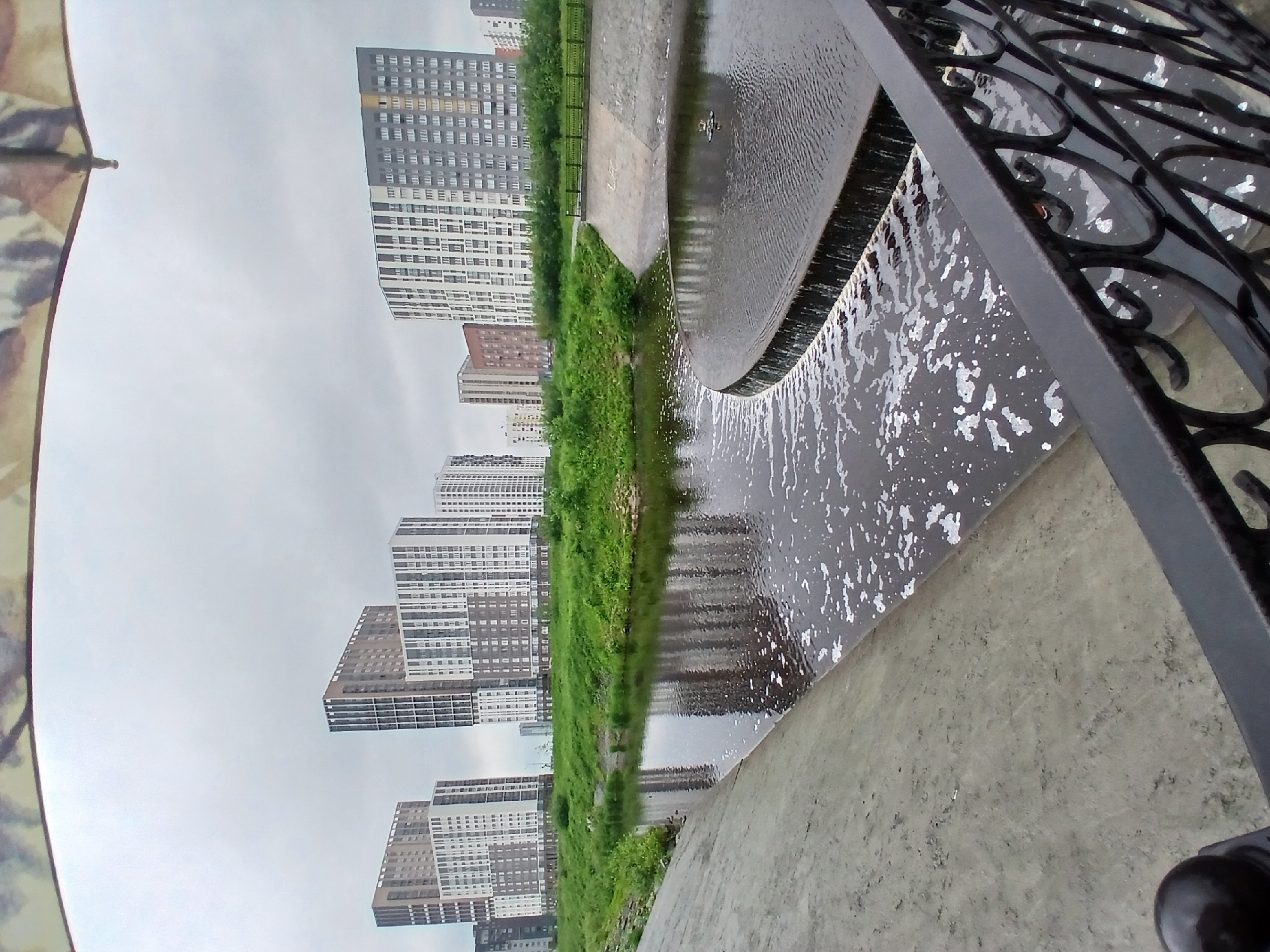 Morning walk documented along Yekaterinburg's Iset River embankment