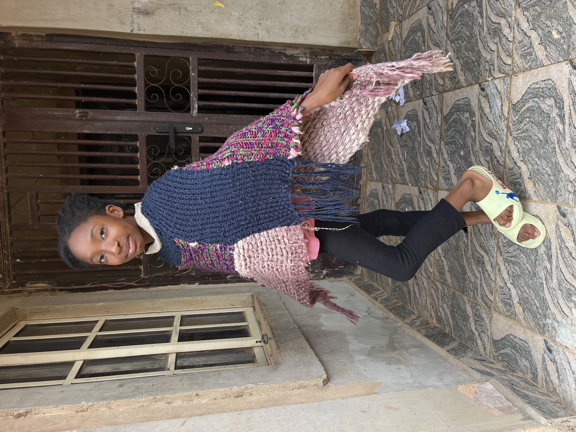 Young girls photographed outside residential buildings Friday morning