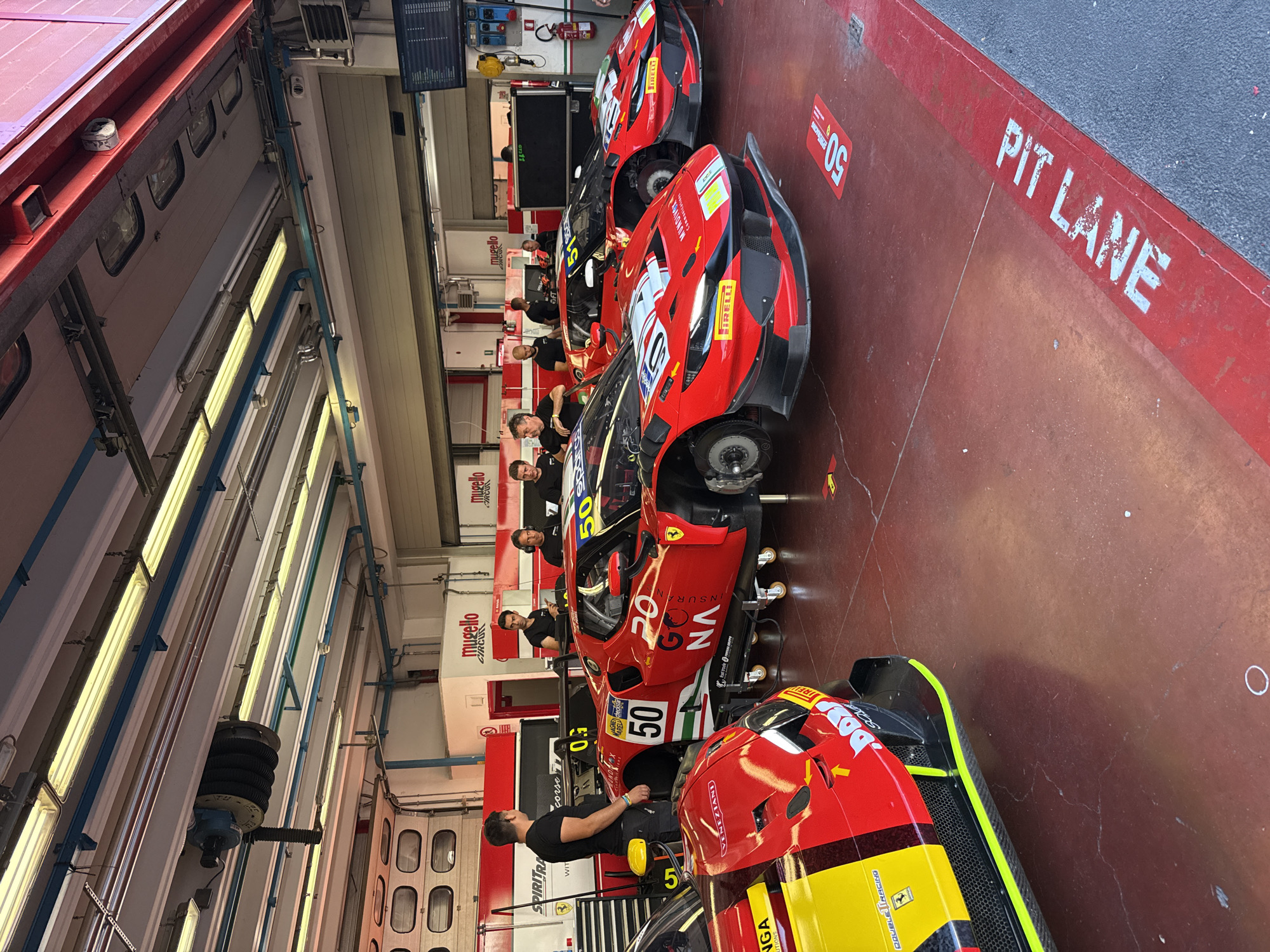 Lamborghini GT3 cars prepped in Mugello pit garages