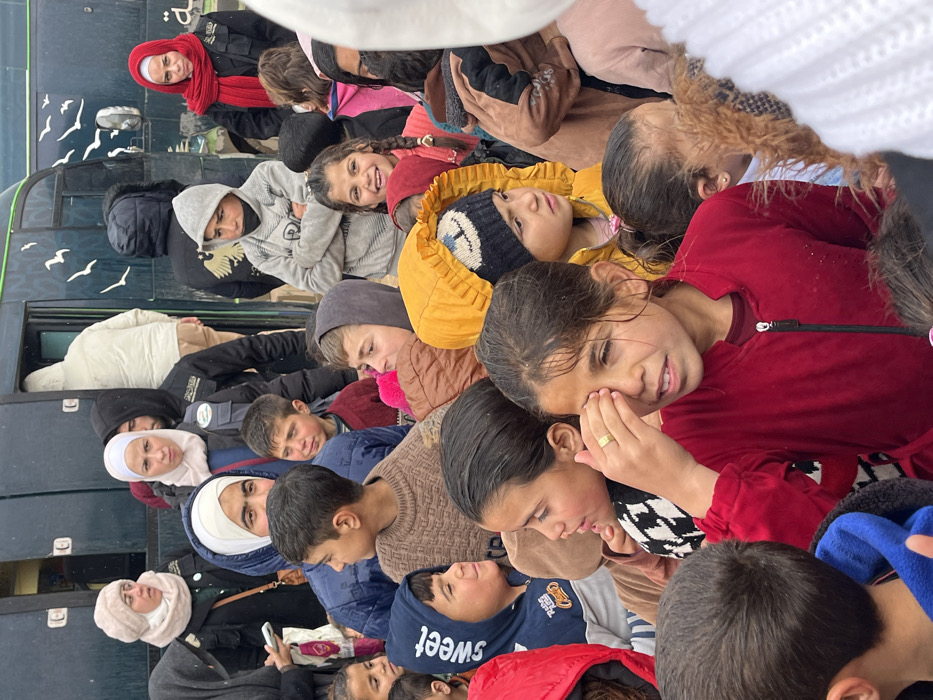 Humanitarian aid distribution draws crowds at Syrian refugee camps