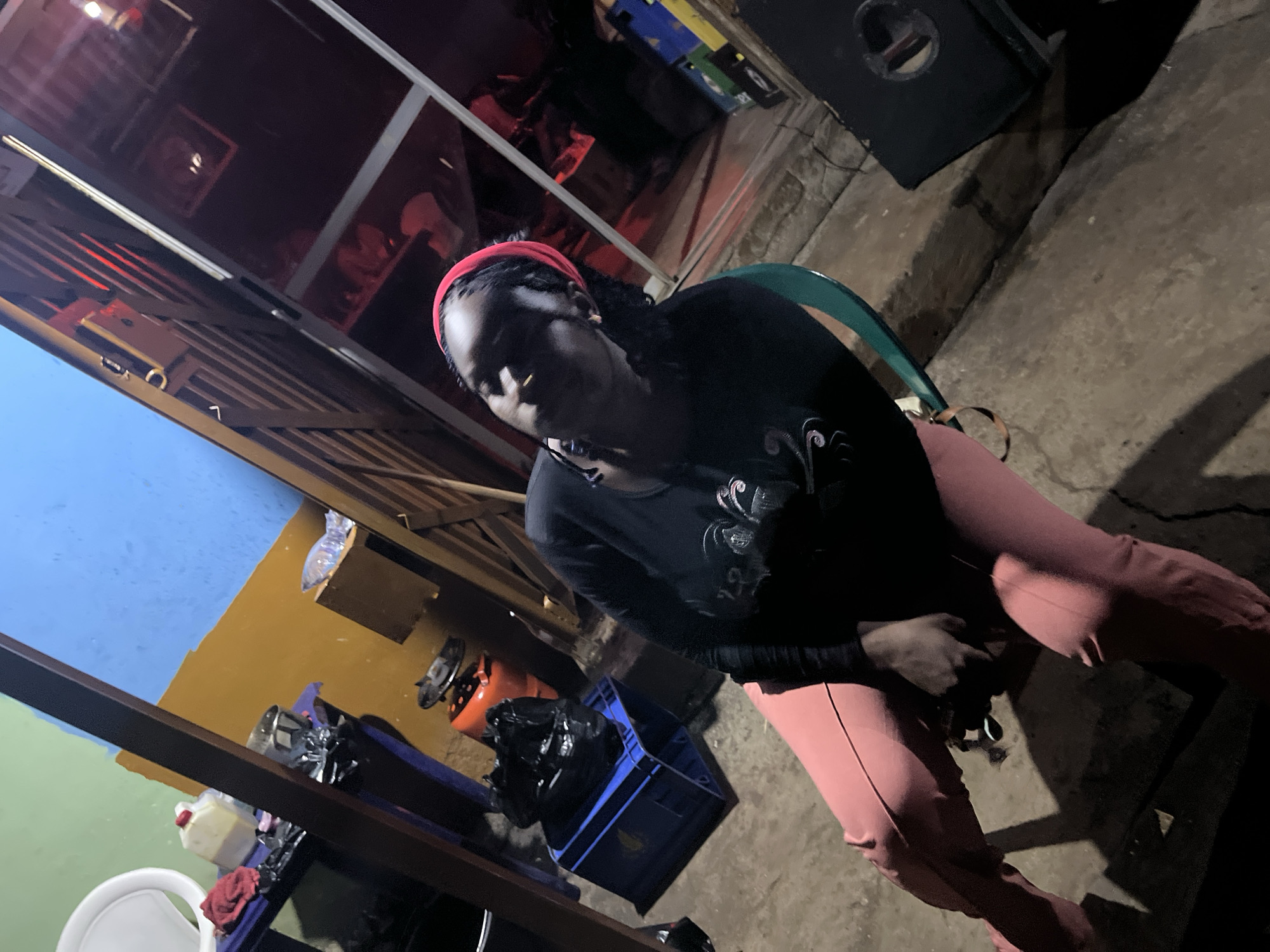 Late-night grilling and hanging out in Jos, Nigeria