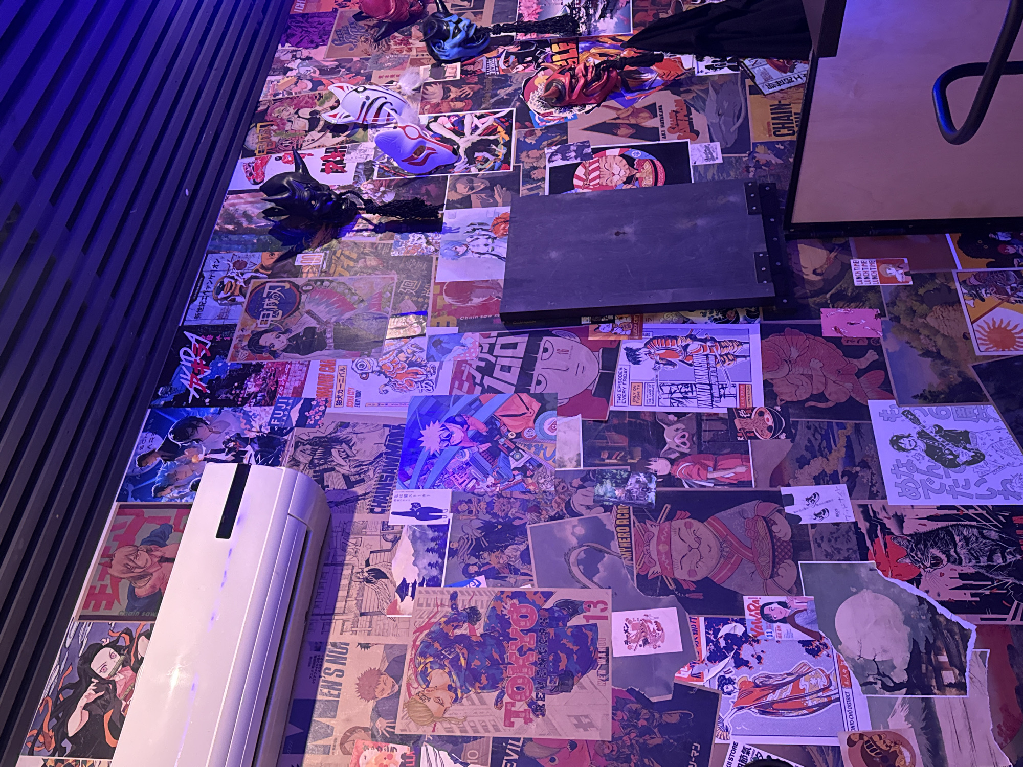 Anime-themed club restaurant captured during evening social activity
