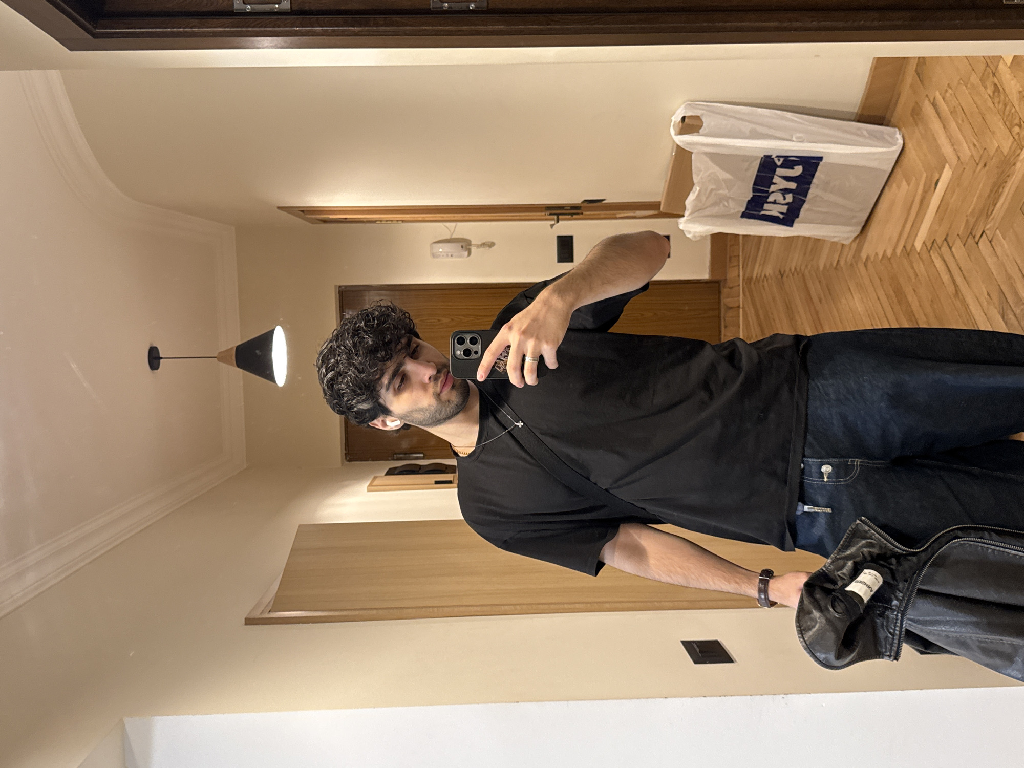 Man takes selfie in hotel hallway in Yerevan