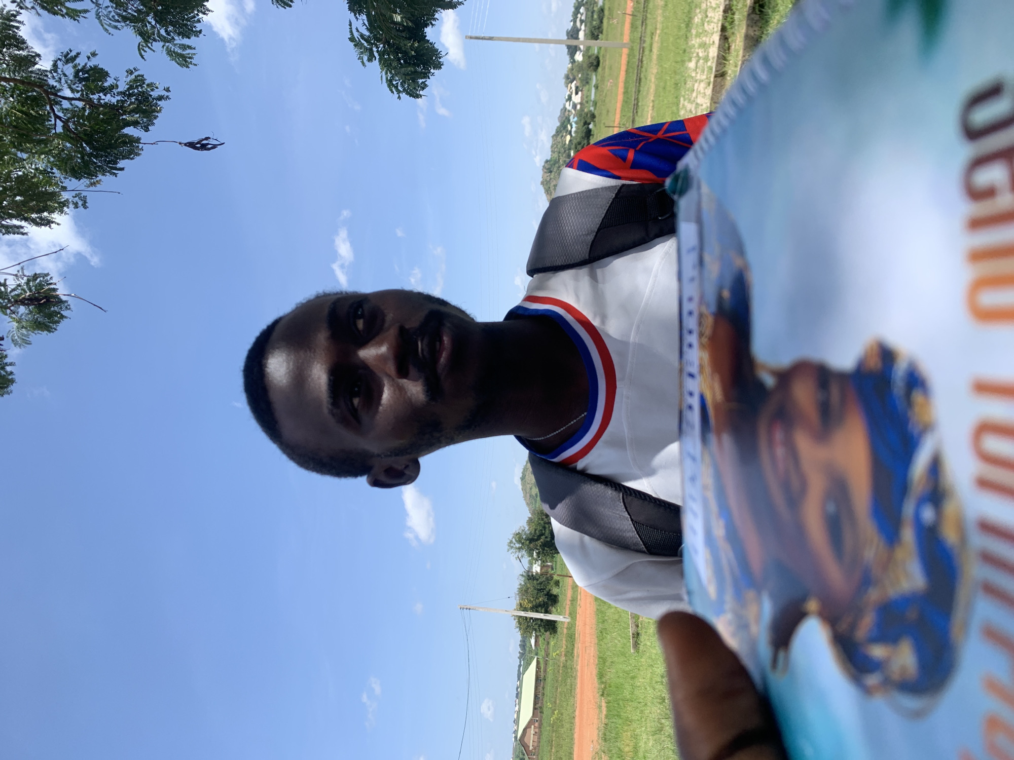 Group hangout in Gwafan with a Nigerian flag flying nearby