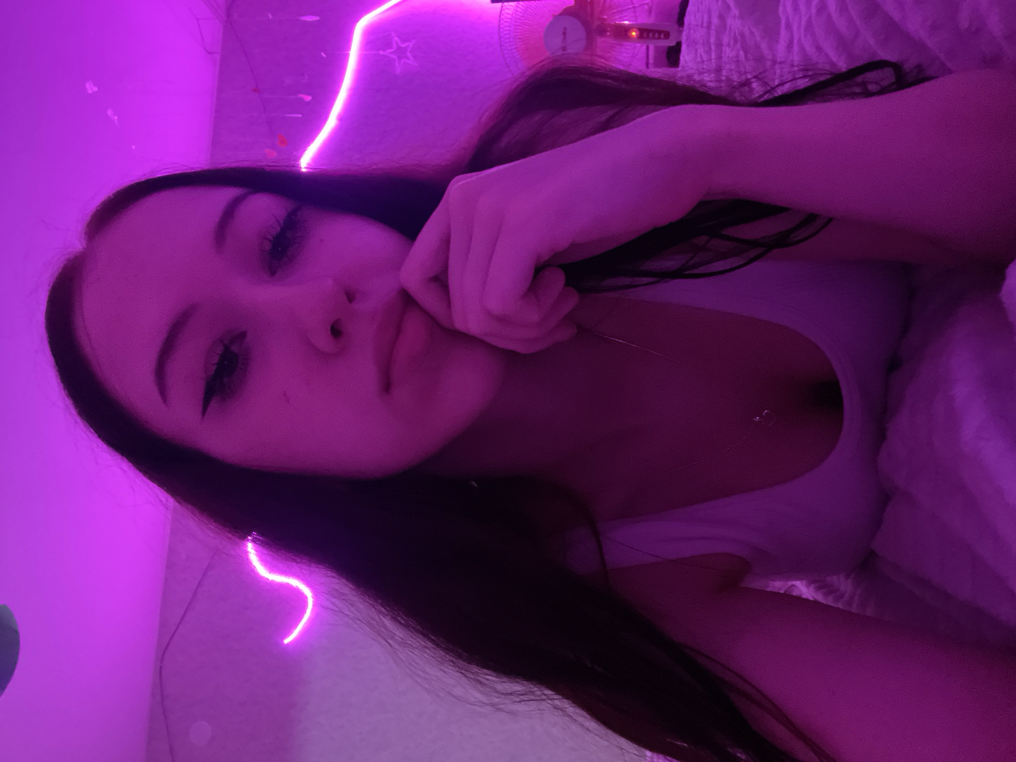 Evening selfie session with neon lighting and cat in Votkinsk