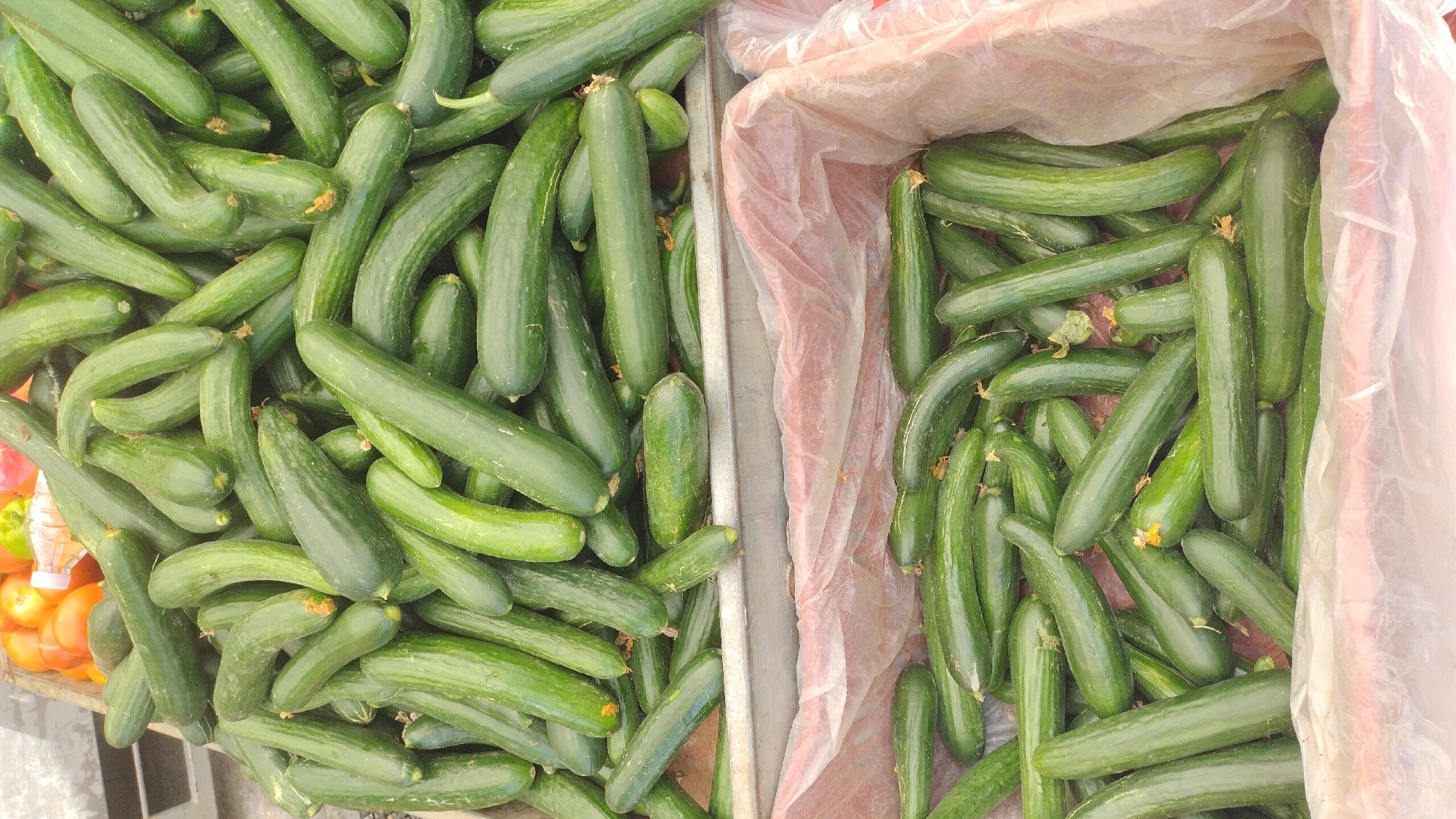 Morning street market bustling with fresh produce in Perea, Greece