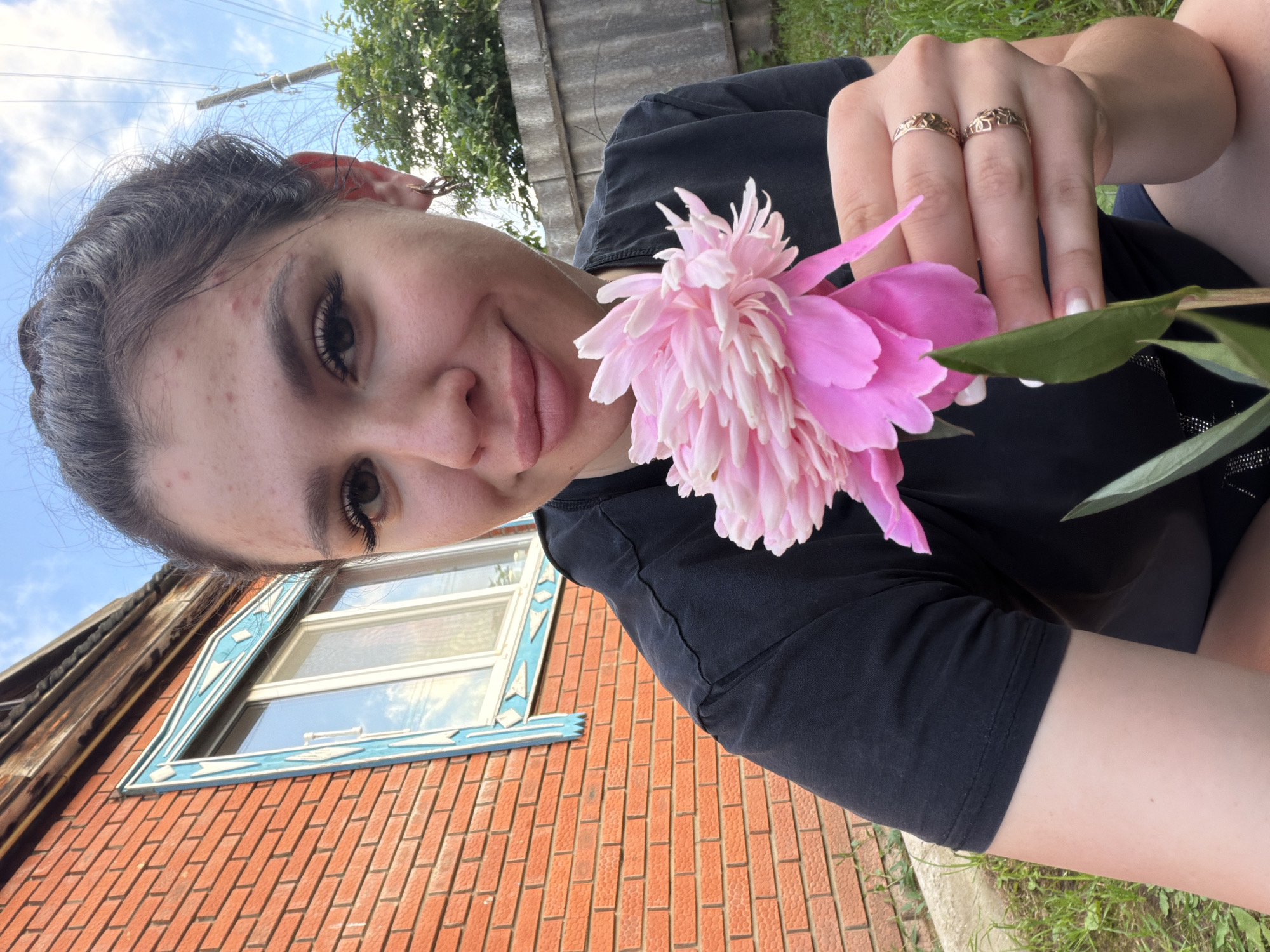 Lazy summer afternoon in a Russian backyard with peonies