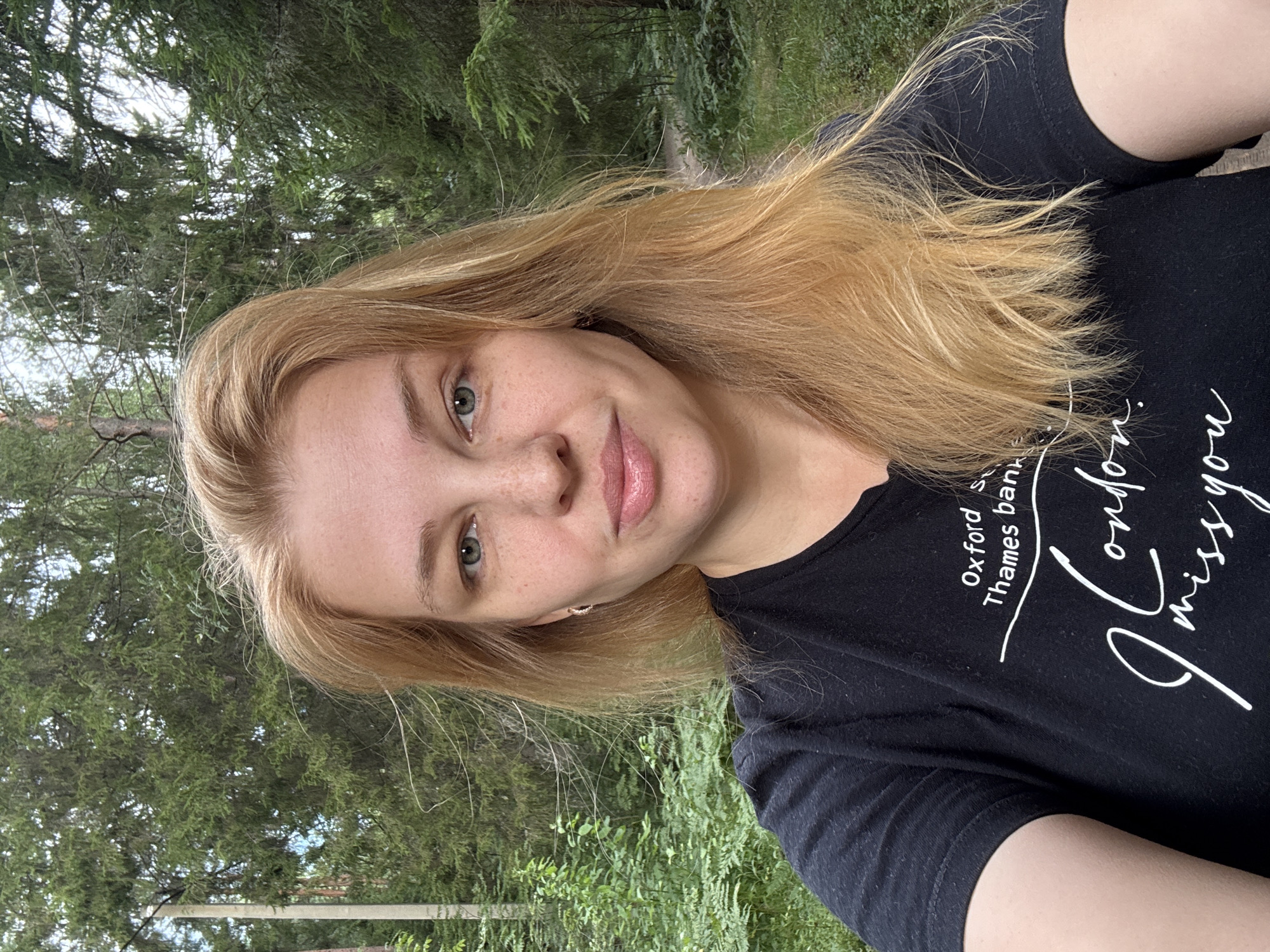 Forest path selfie in rural Russia, London nostalgia on the shirt