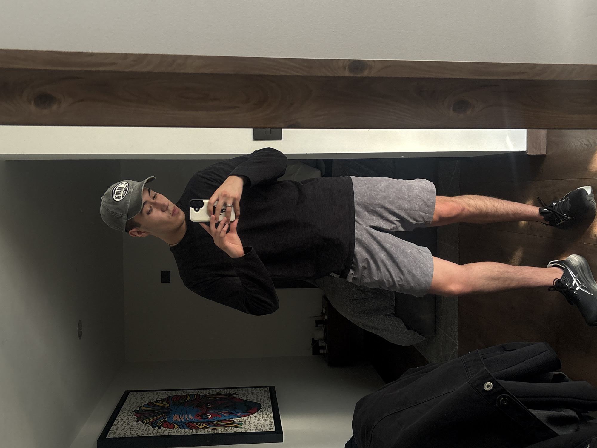 Young man takes mirror selfie in San Bernardino Tlaxcalancingo