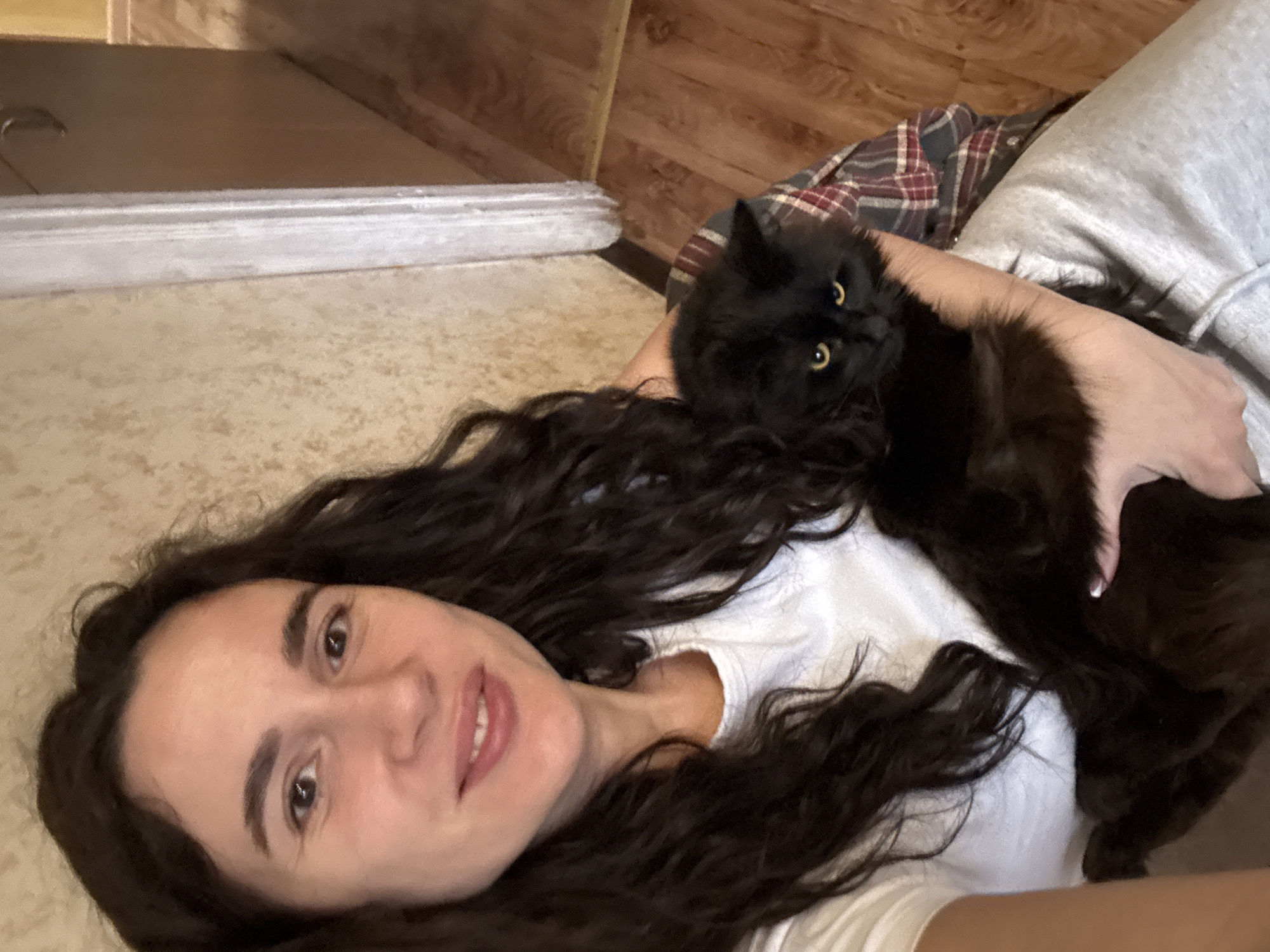 Woman's quiet afternoon with cat and salad documented in Chaikovsky