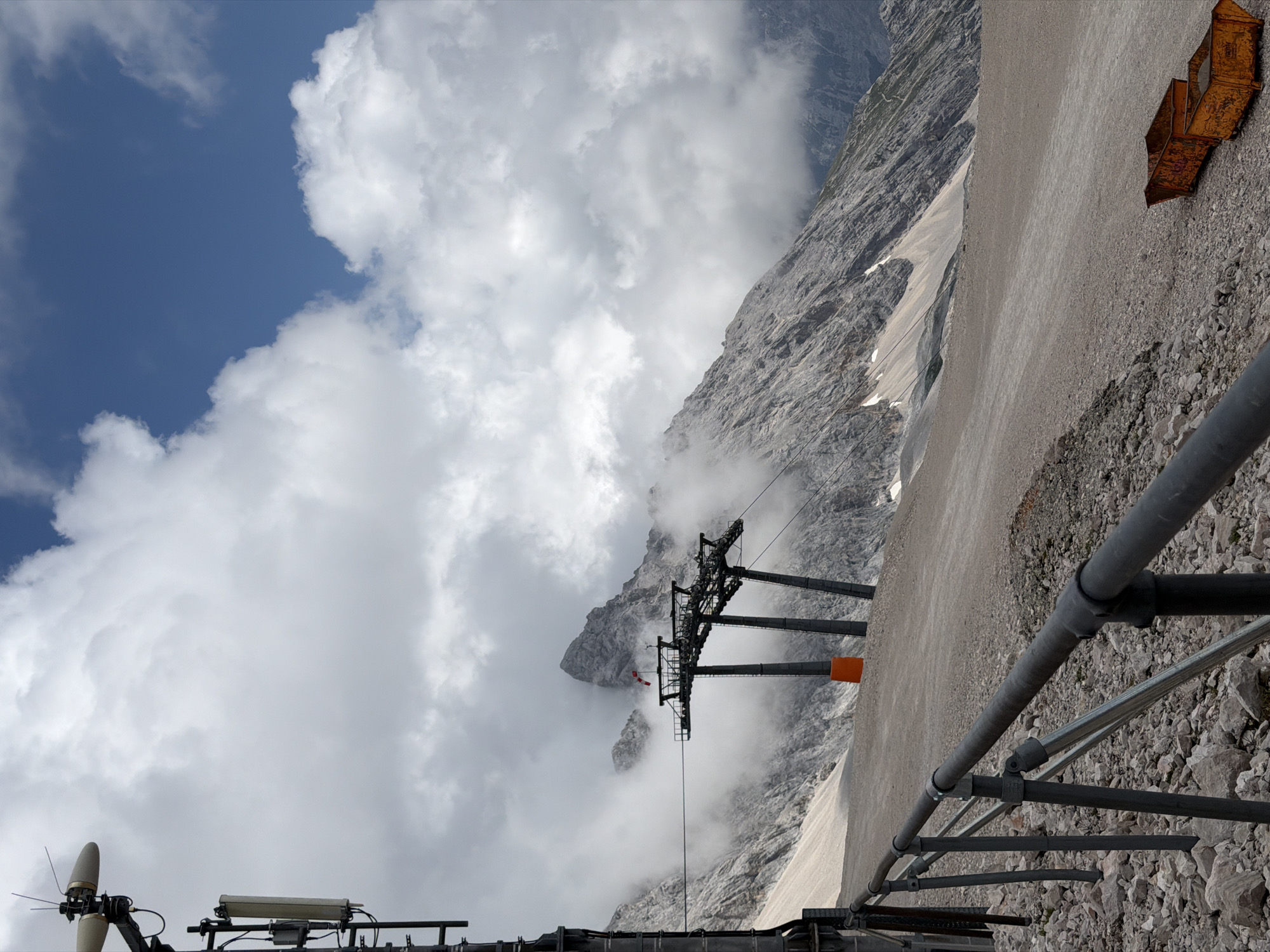 Snow groomers and heavy equipment at a Garmisch-Partenkirchen mountain site