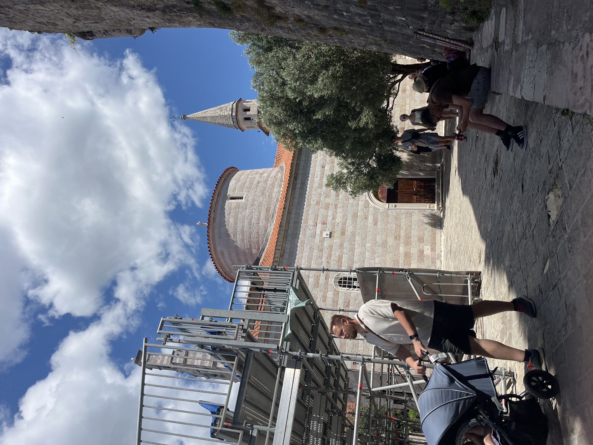 Flutist performs informal session in Montenegro's historic Budva Old Town