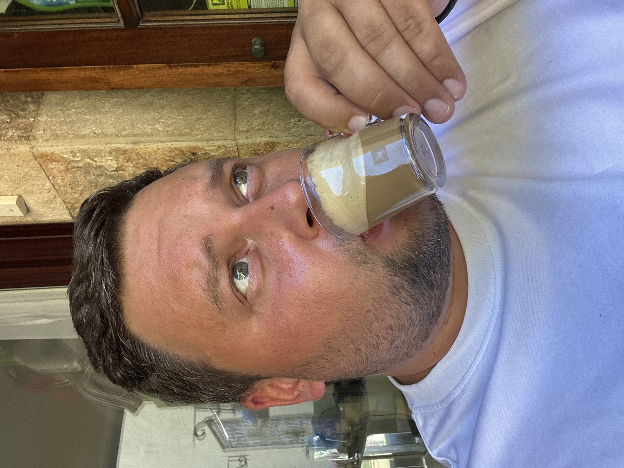 Man enjoys coffee and squid lunch in Sant Feliu de Guíxols