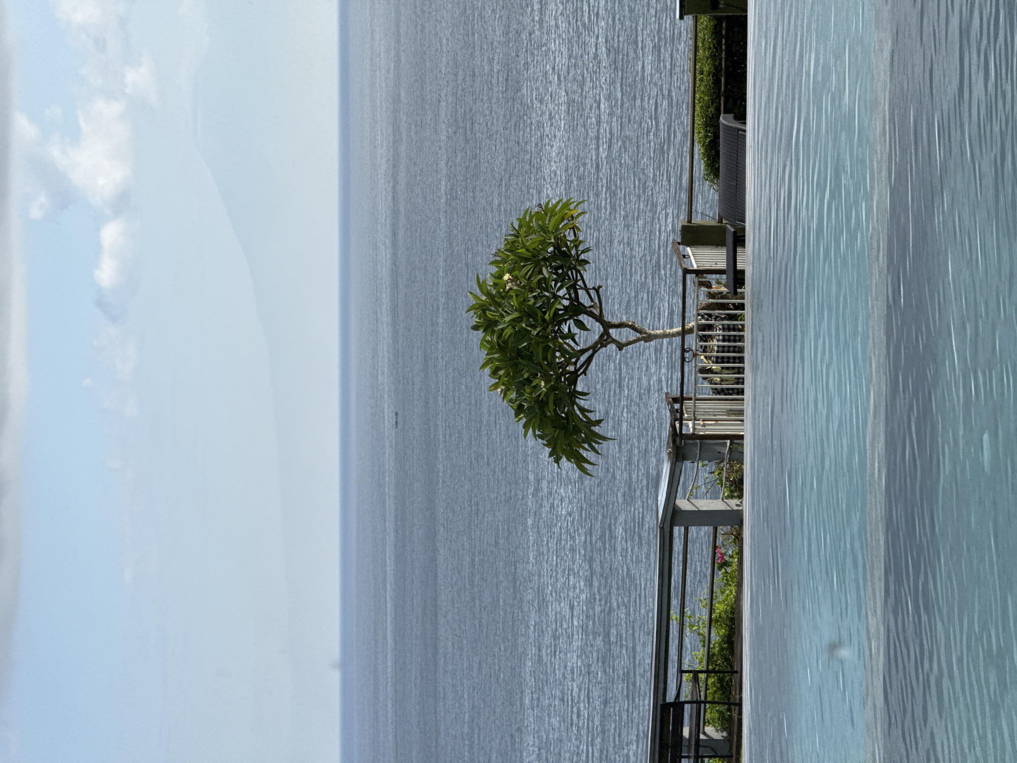 Peaceful ocean views captured from Kuta Selatan balcony and pool