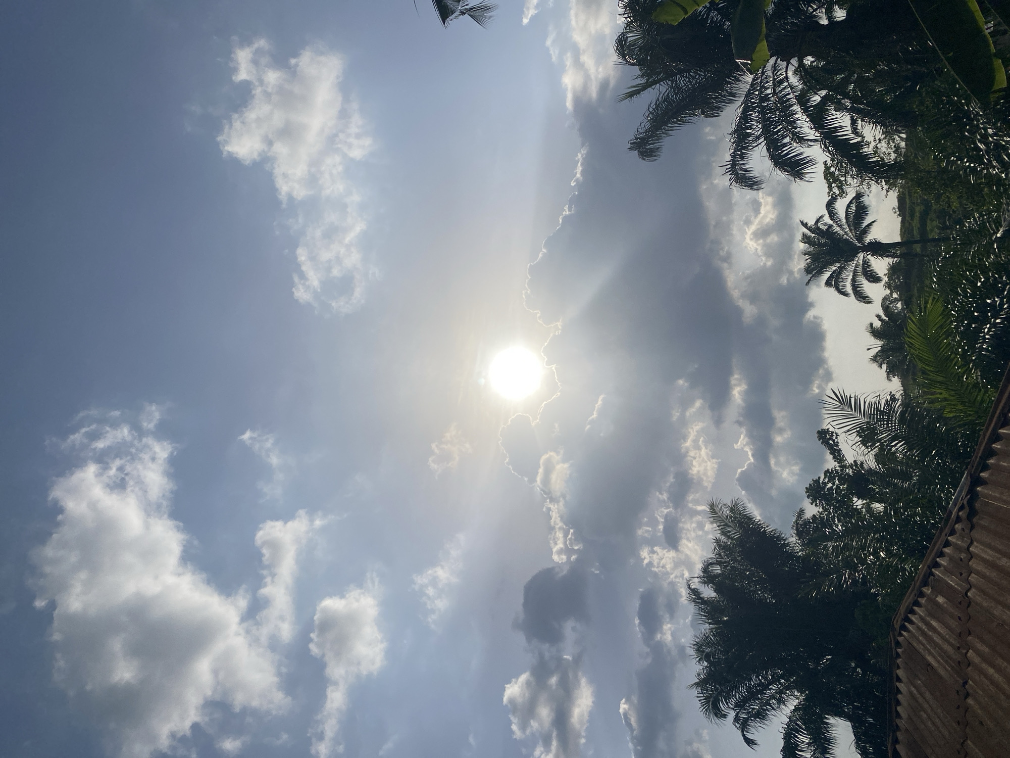 Bright sun breaks through clouds over Achara, Nigeria