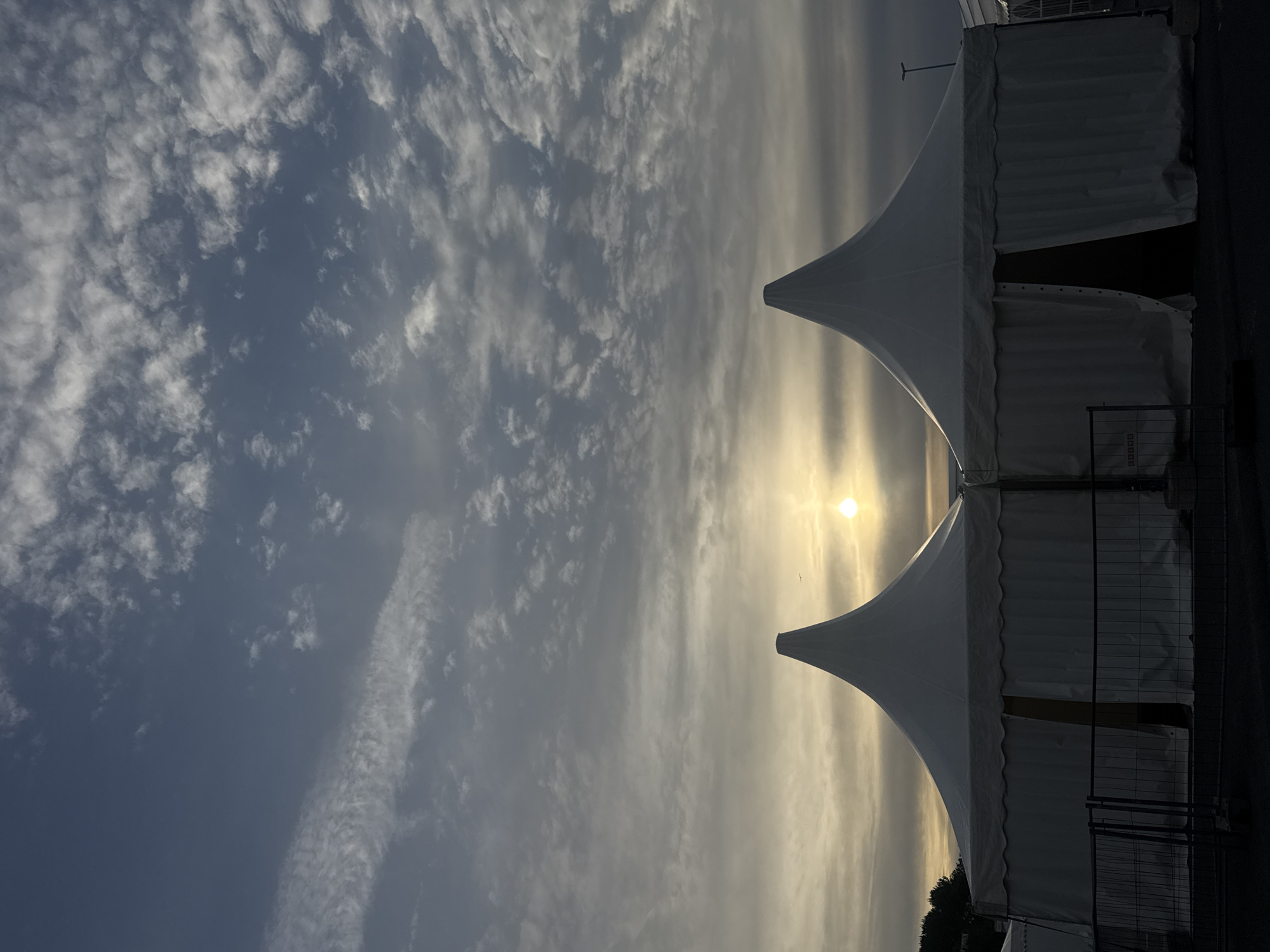 White tent event setup observed in Tallinn marina area