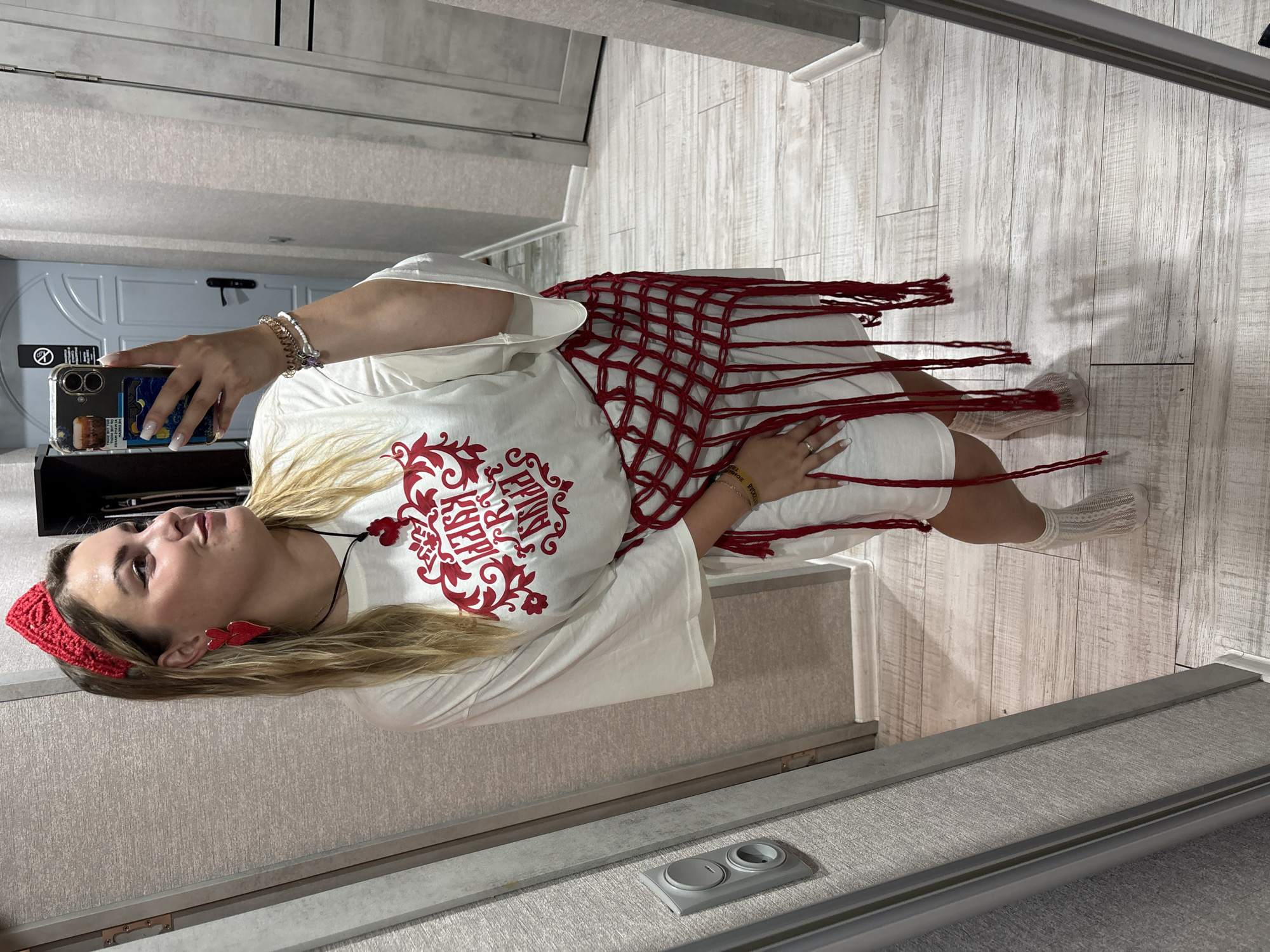 Mirror selfie session in Kungur, red-and-white outfit throughout