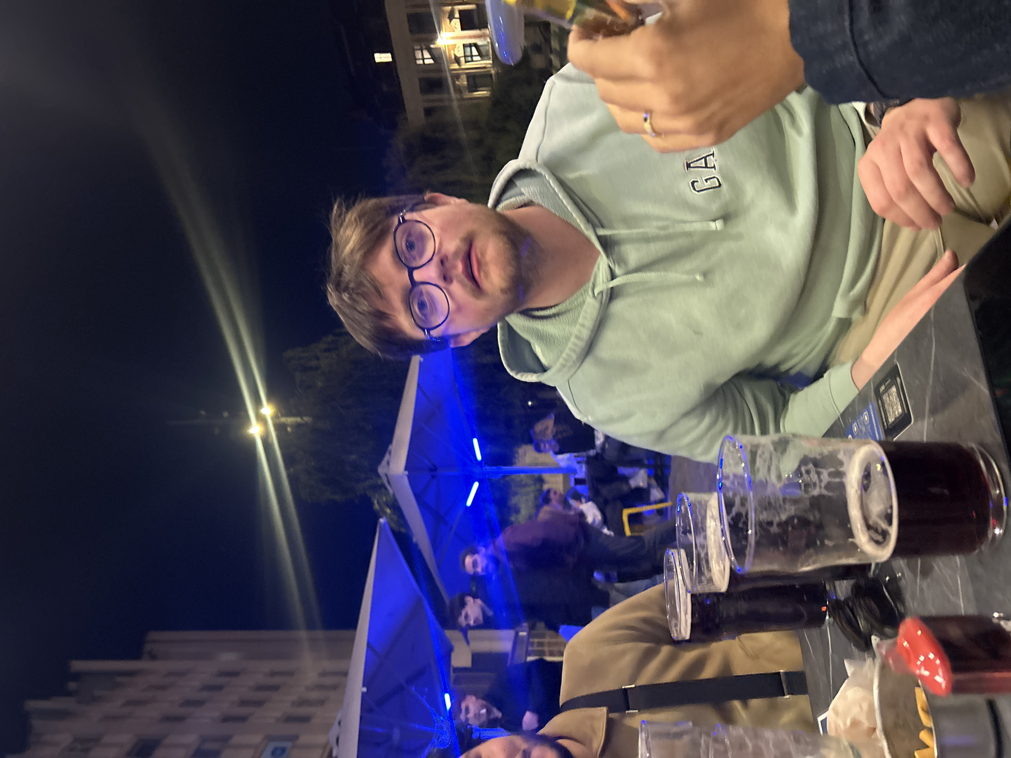 Evening social scenes captured at Lille cafes and bars