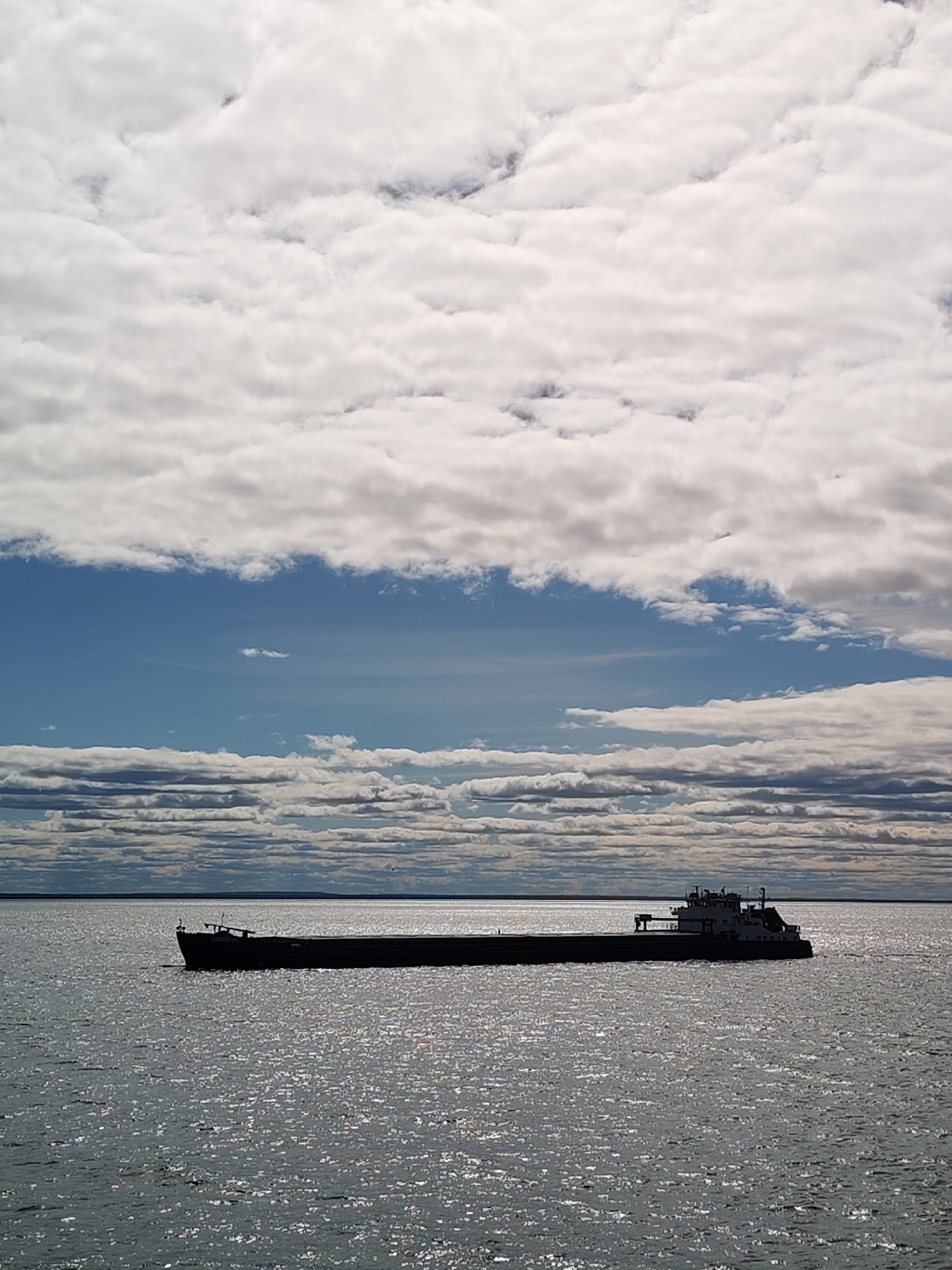 Cargo barge crosses Lake Beloye near Belozersk, Russia
