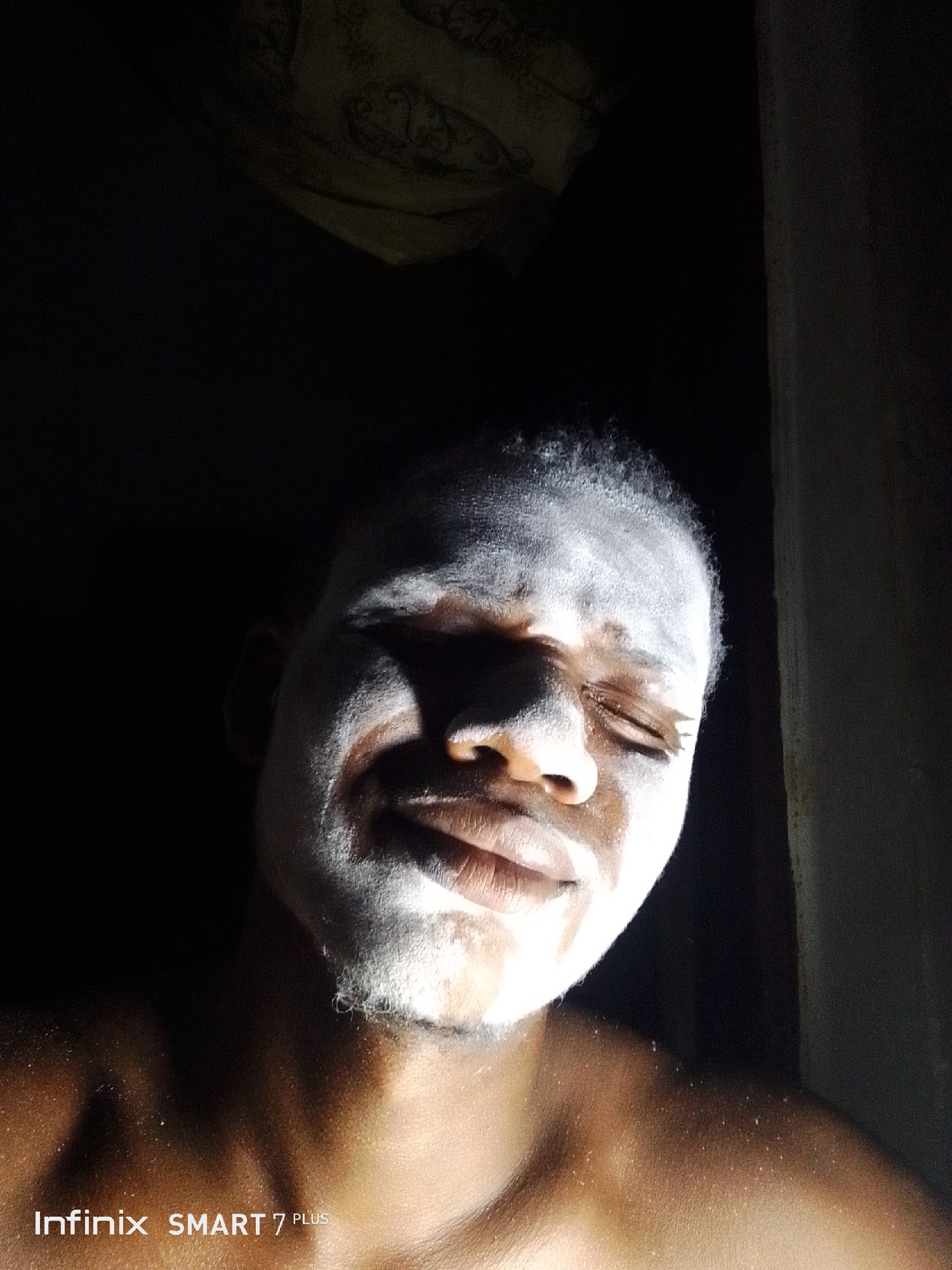 Person observed with white substance covering face