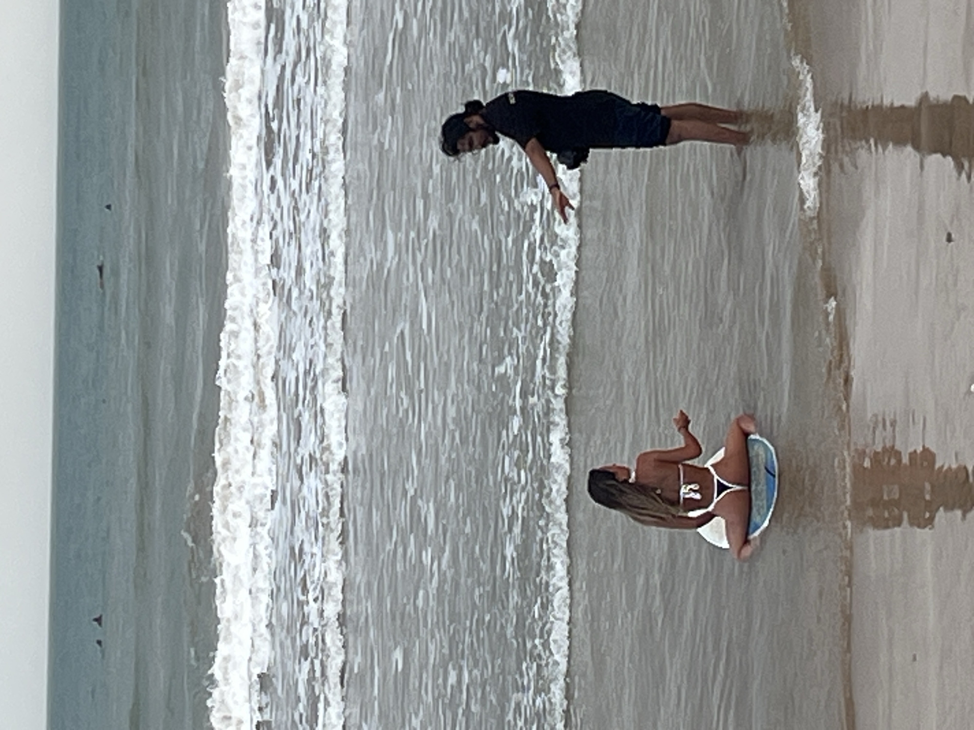Surfboard shoot in shallow water, Peleana beach, overcast skies