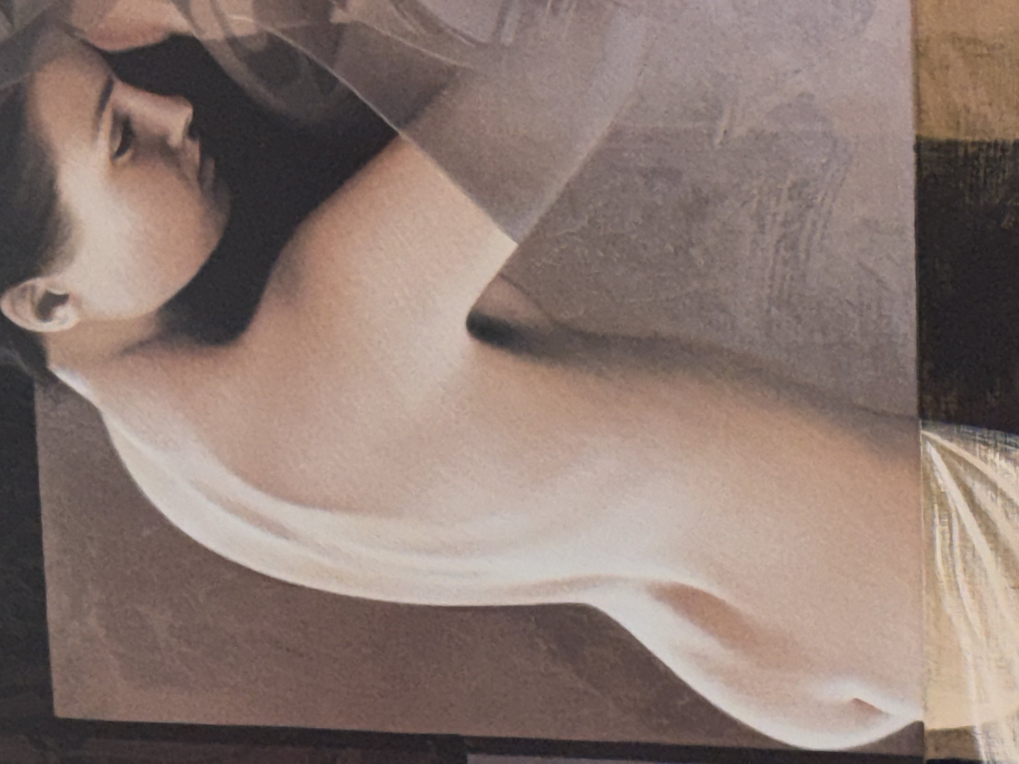 Woman photographed lying down with translucent covering