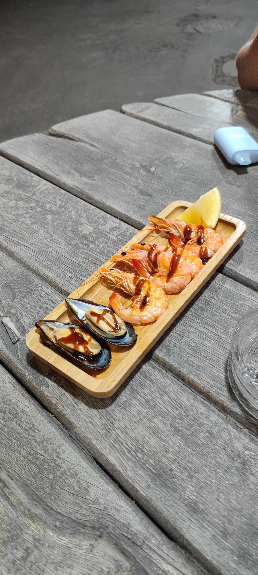 Seafood and beers at an outdoor spot in Yerevan at night