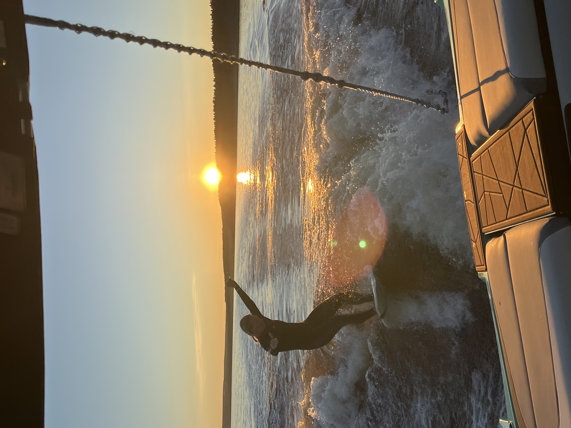 Wake surfing at golden hour on a Russian lake