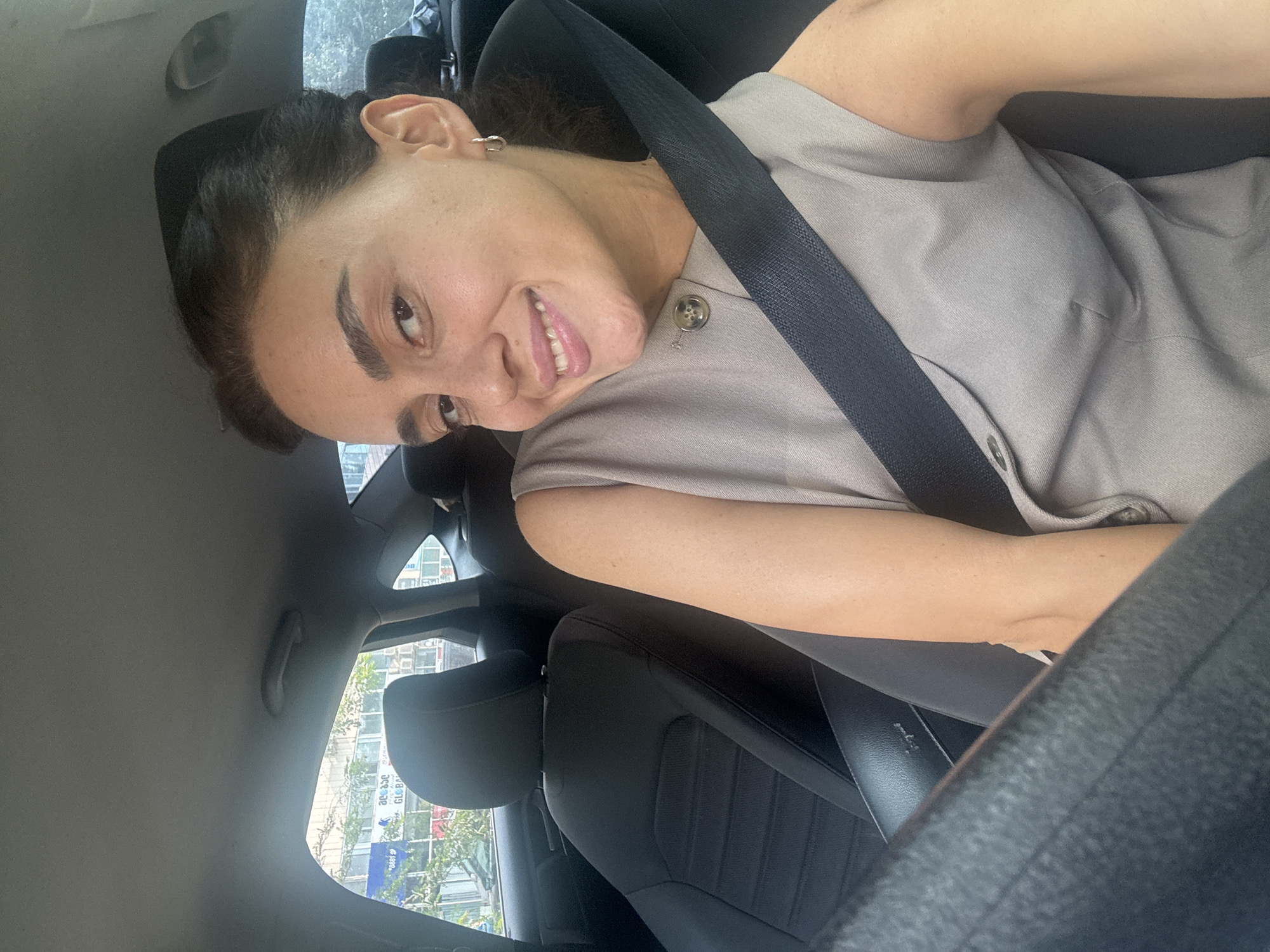 Casual in-car moments during a Tbilisi afternoon