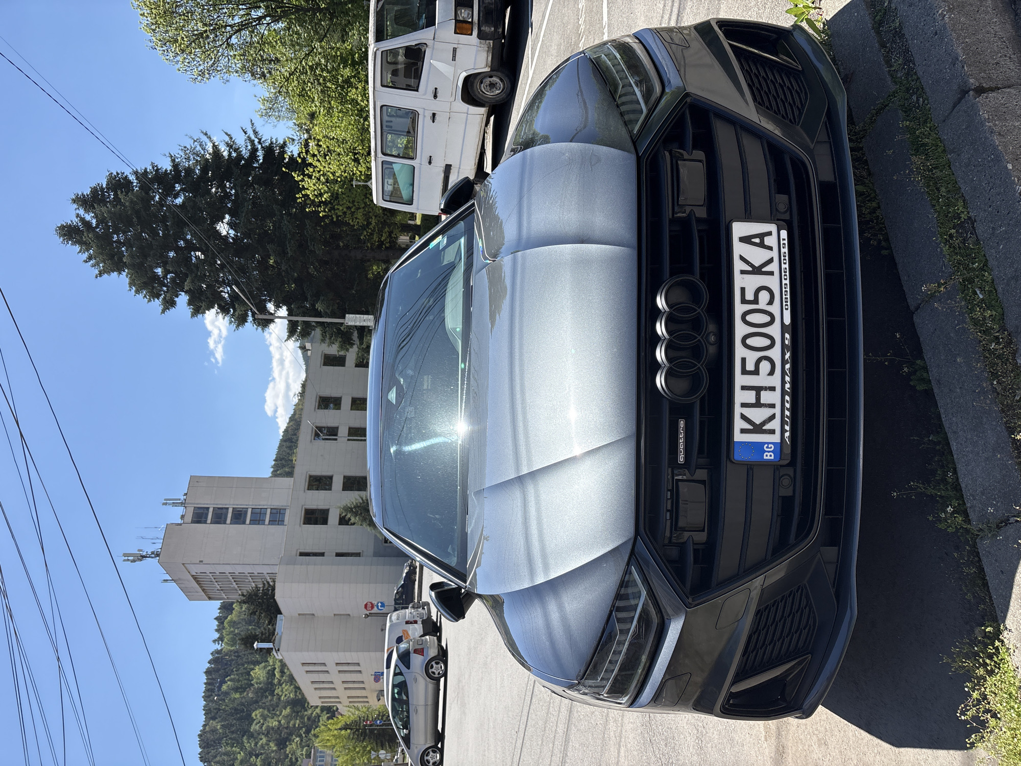 Child plays with toy car on Kyustendil street