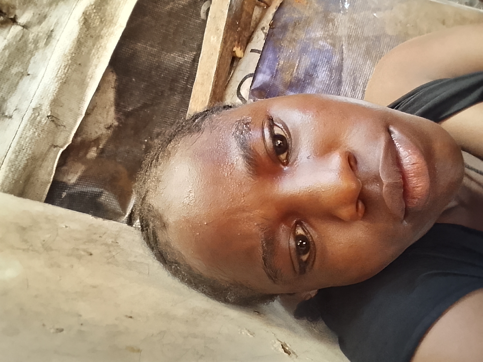 Auto mechanics repair engines at Onitsha street market