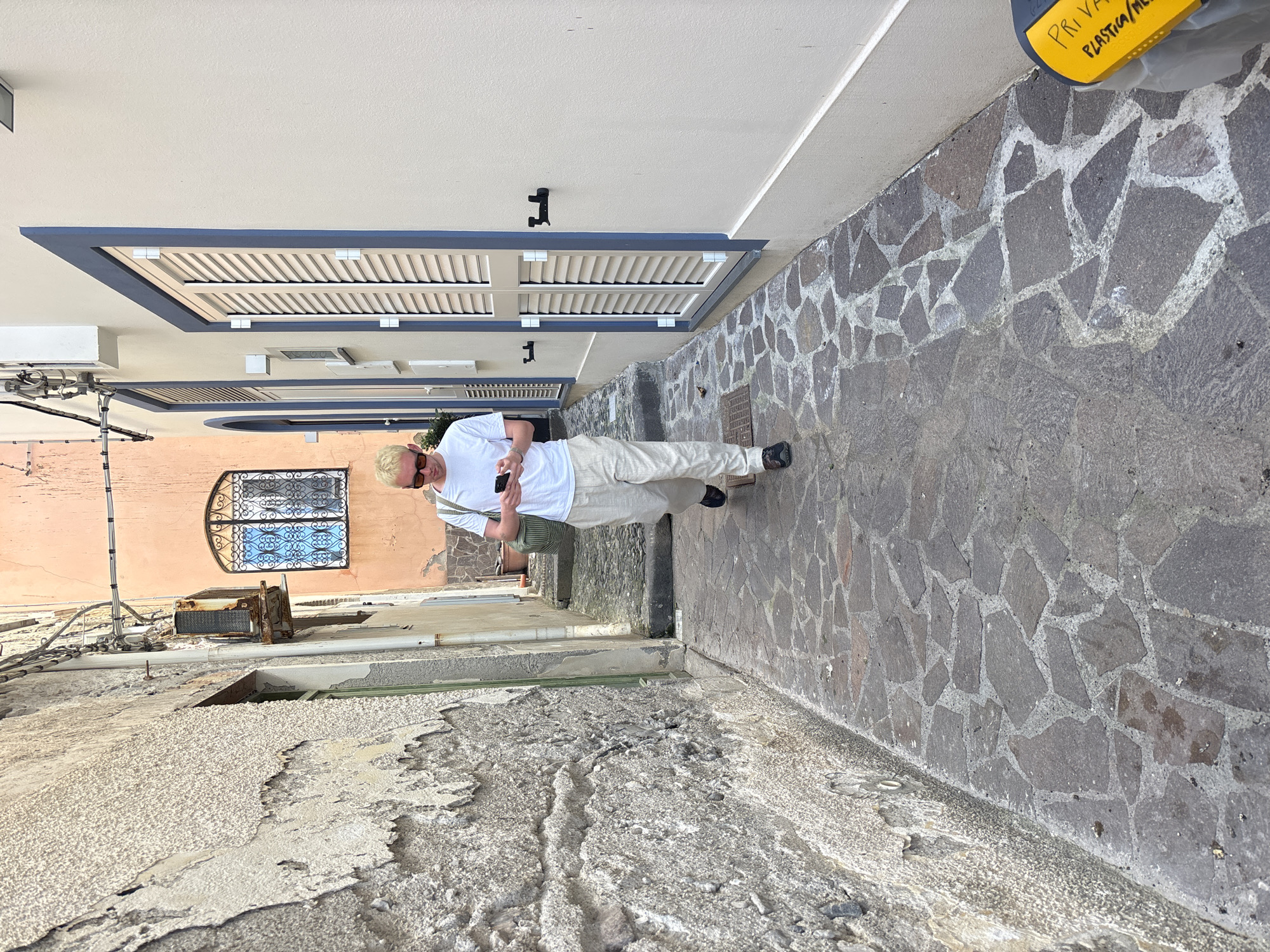 Everyday phone use and digital graphics captured in Lipari