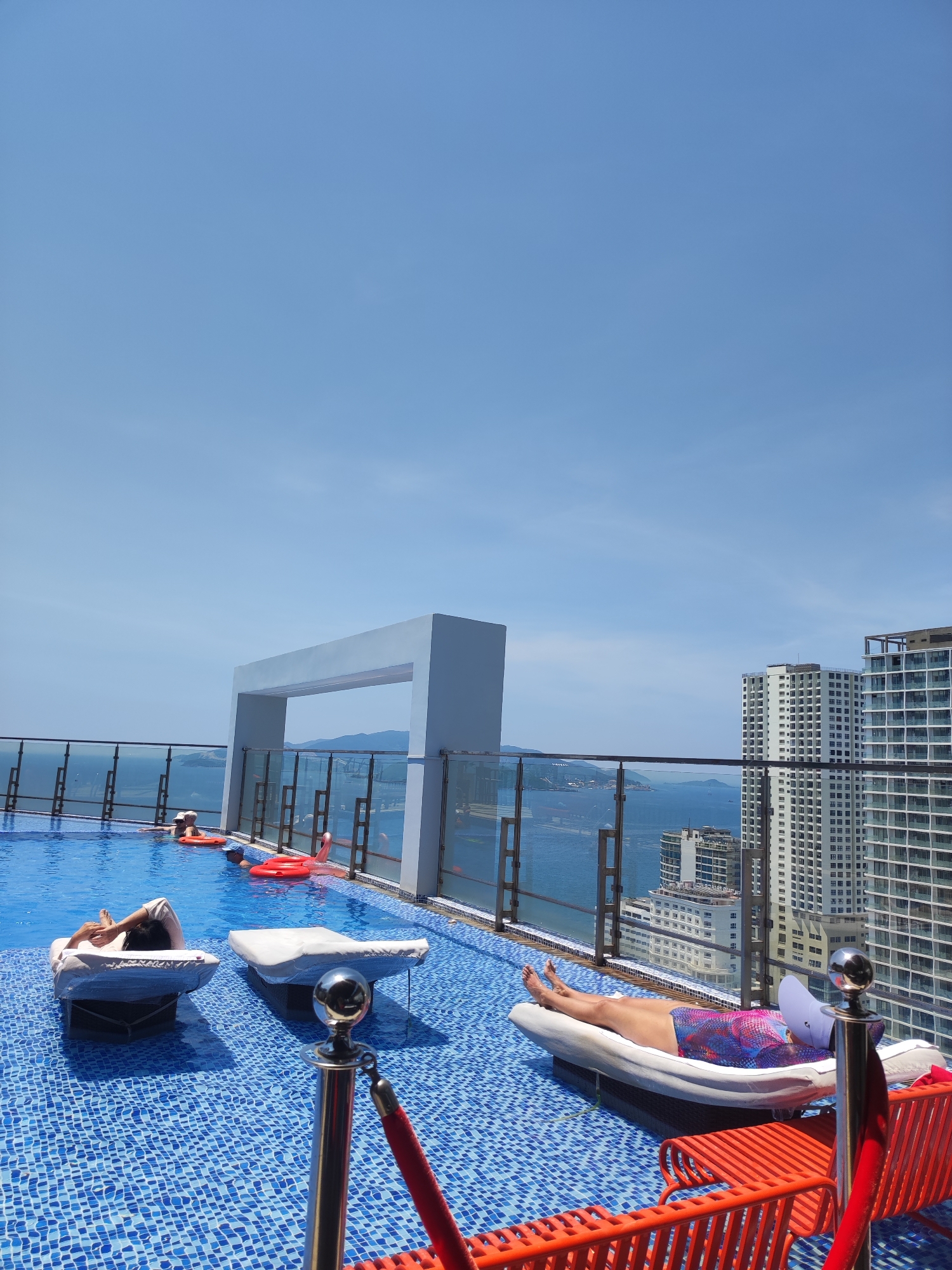 Rooftop pool hang in Nha Trang with sweeping coastal views