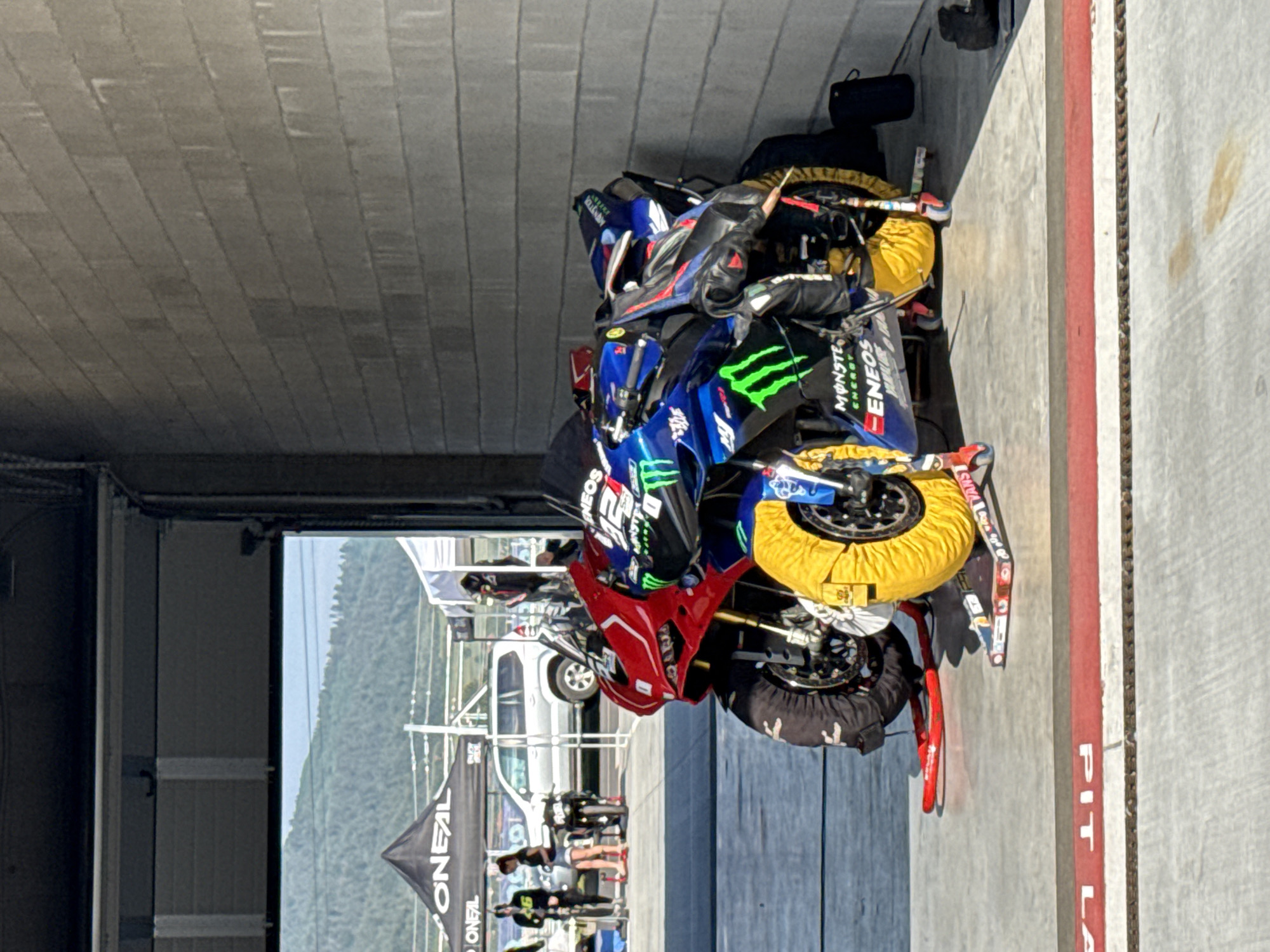 Racing event pit lane activity captured in Dospey, Bulgaria
