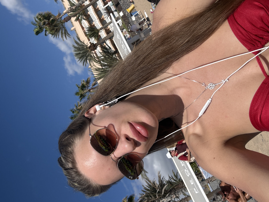 Sunny afternoon beach leisure captured in Los Cristianos, Spain