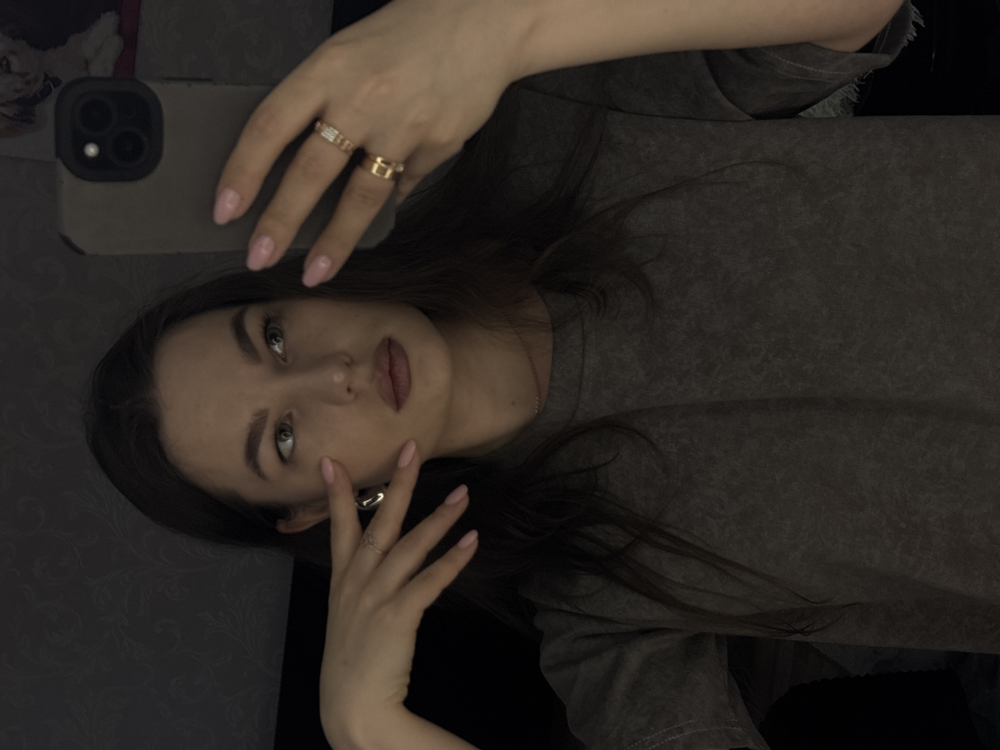 Woman takes selfies with pet dog in Chaikovsky bedroom
