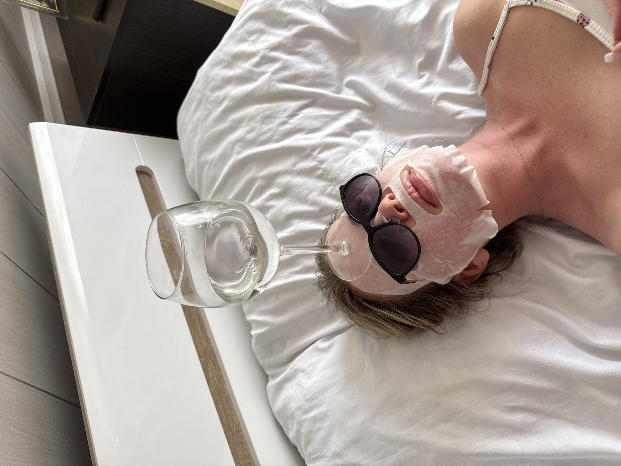 Woman practices self-care routine with face mask in Chaikovsky