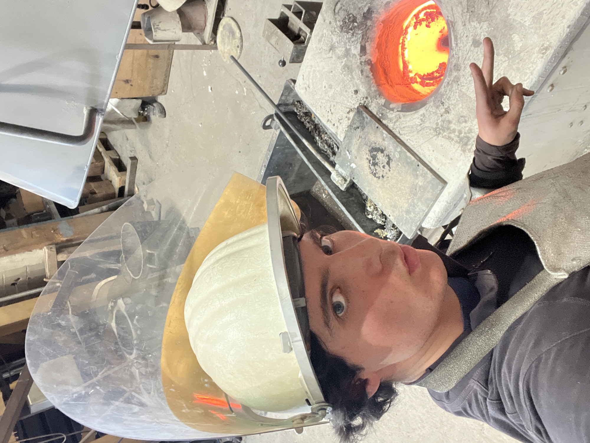 Furnace operator works with molten materials in Saint-Rémy-lès-Chevreuse