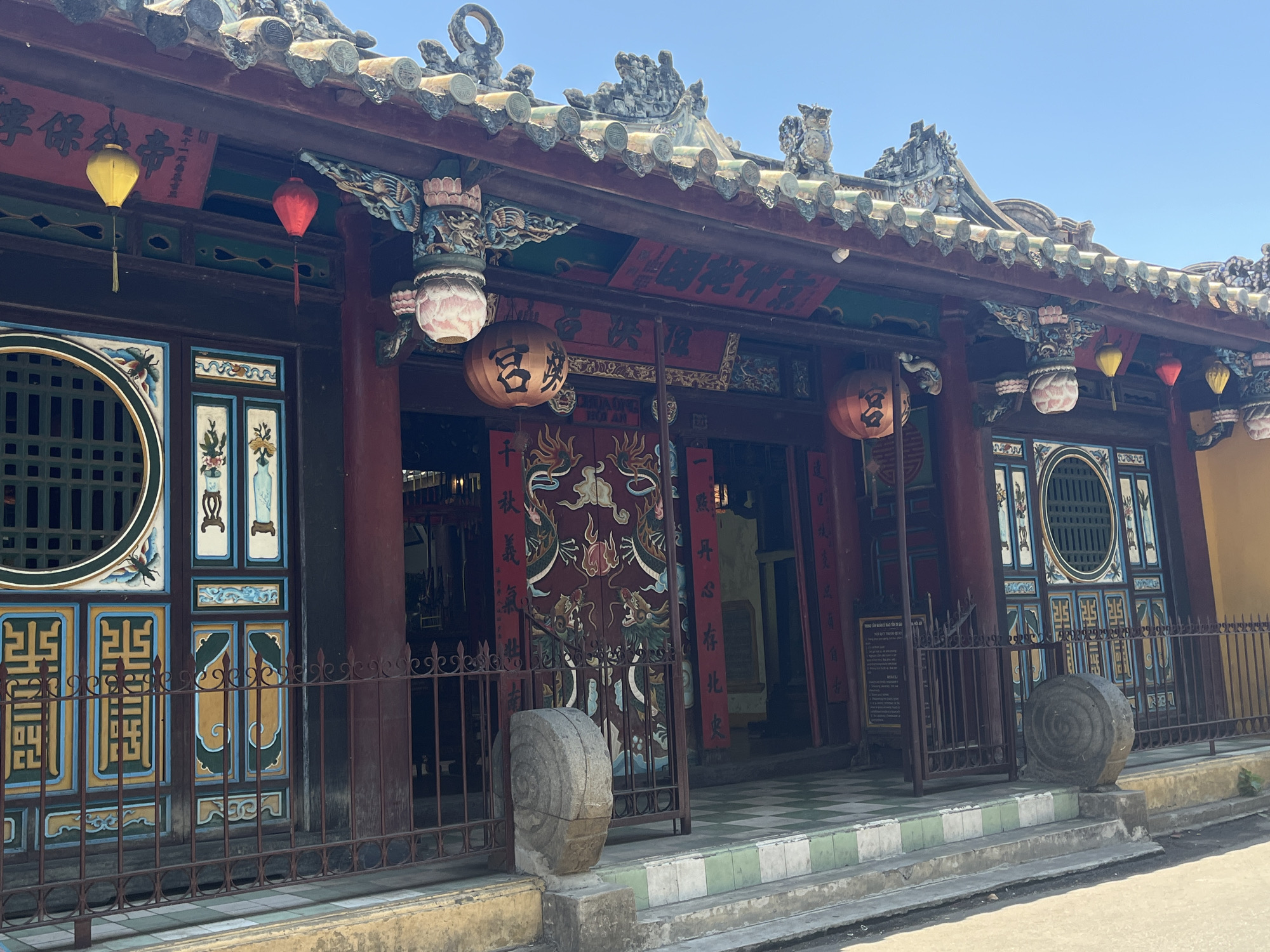 Tourist documents early morning walk through historic Hội An