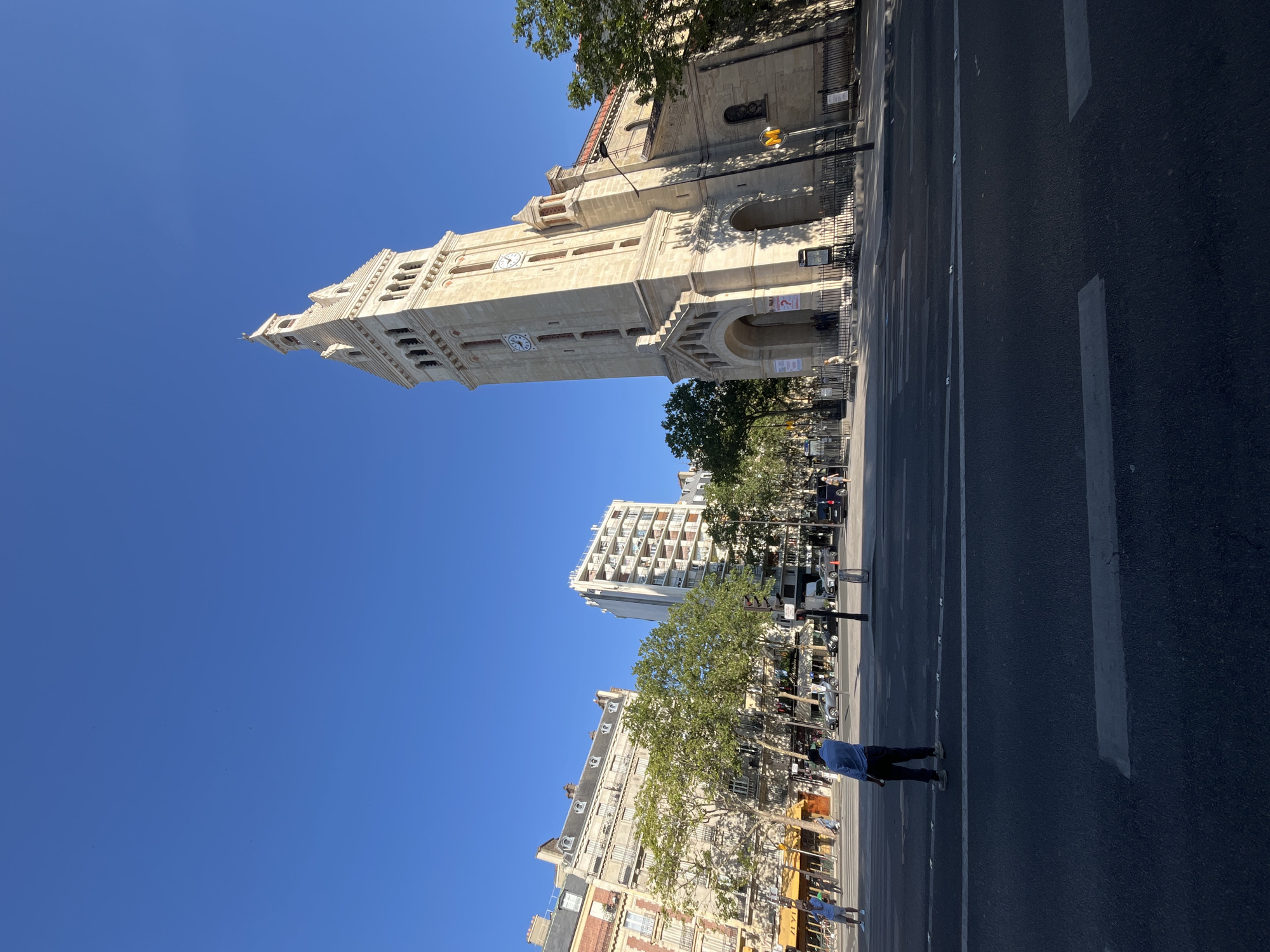 Paris church towers photographed across the city on a clear morning