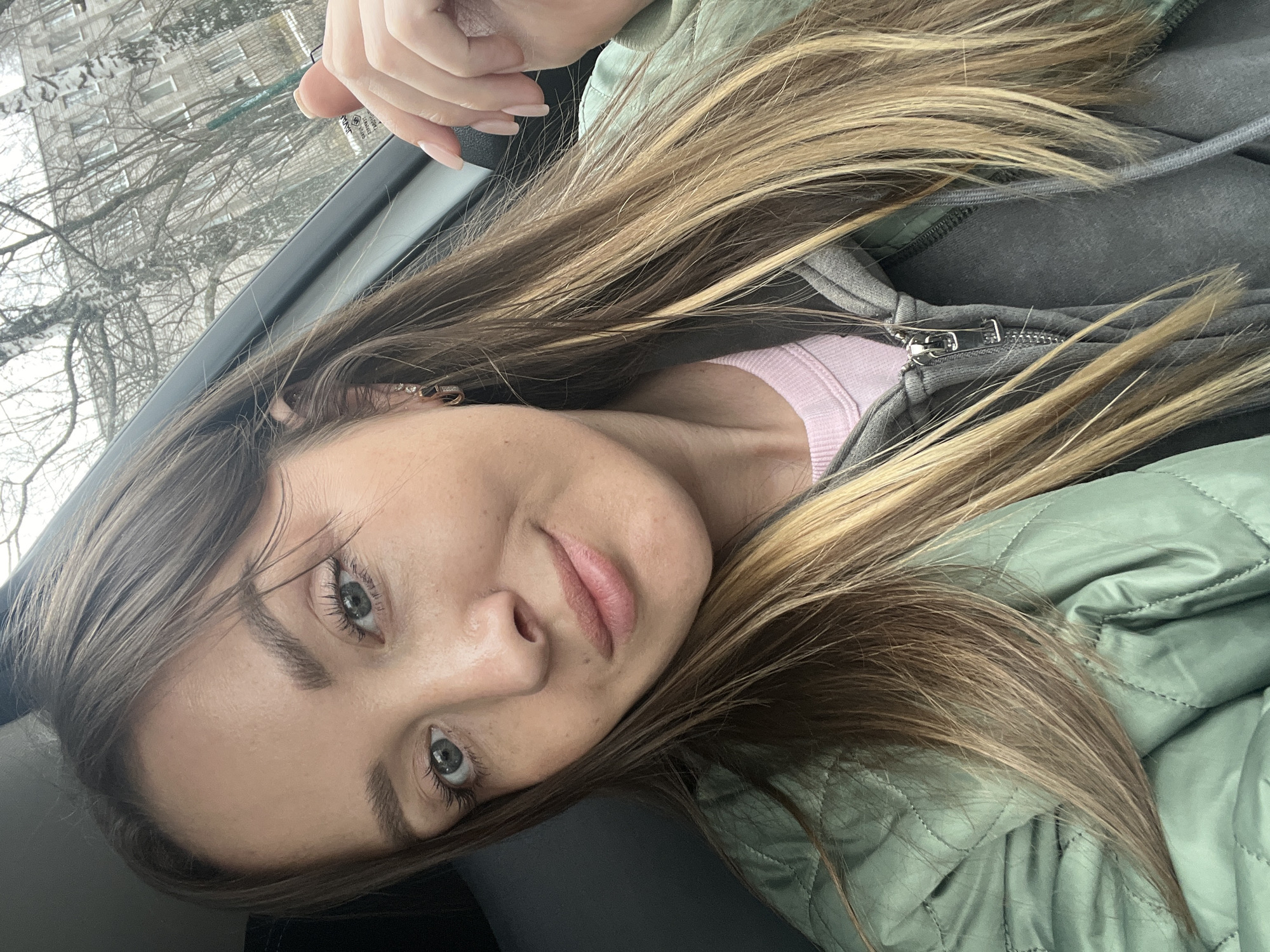Woman takes car selfie in Izhevsk, Russia