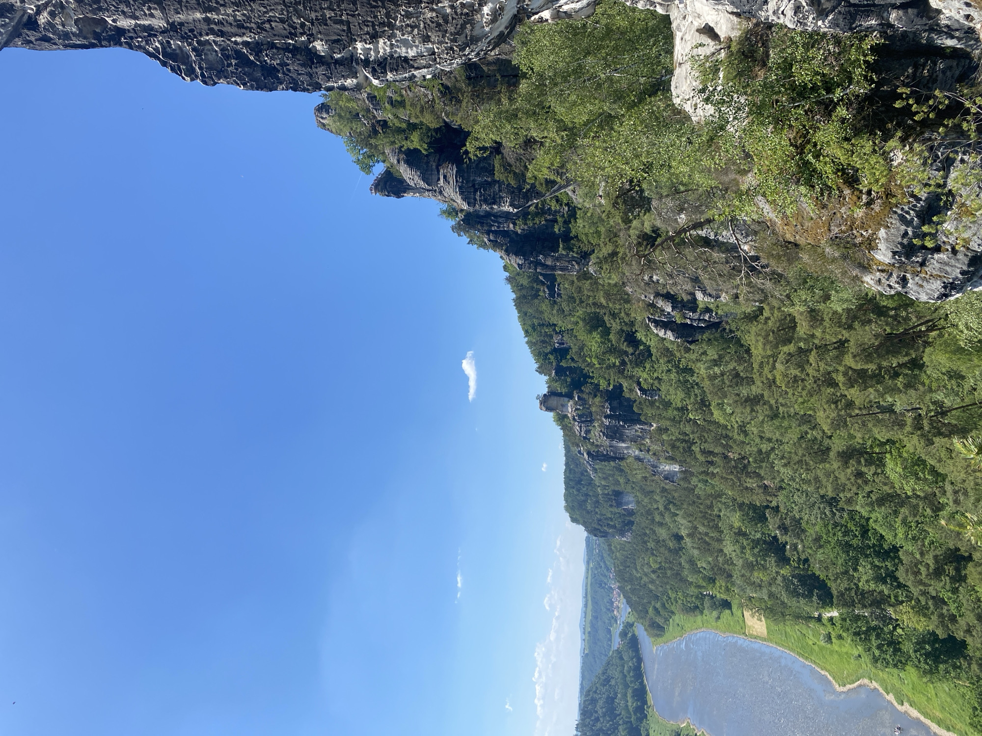 Tourist photographs Bastei rock formation views in Lohmen, Germany