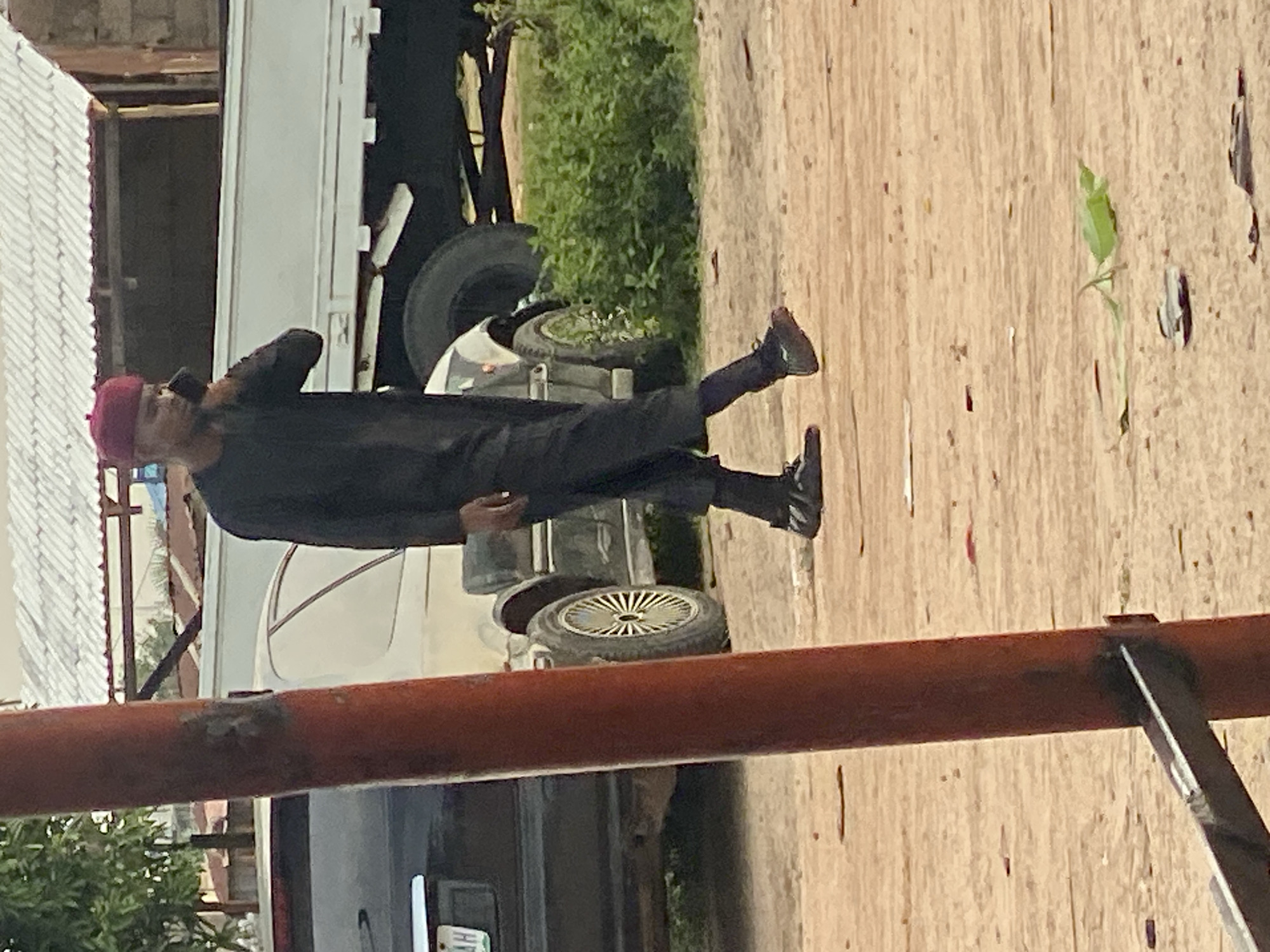 Mechanic repairs cars at roadside workshop in Jalingo