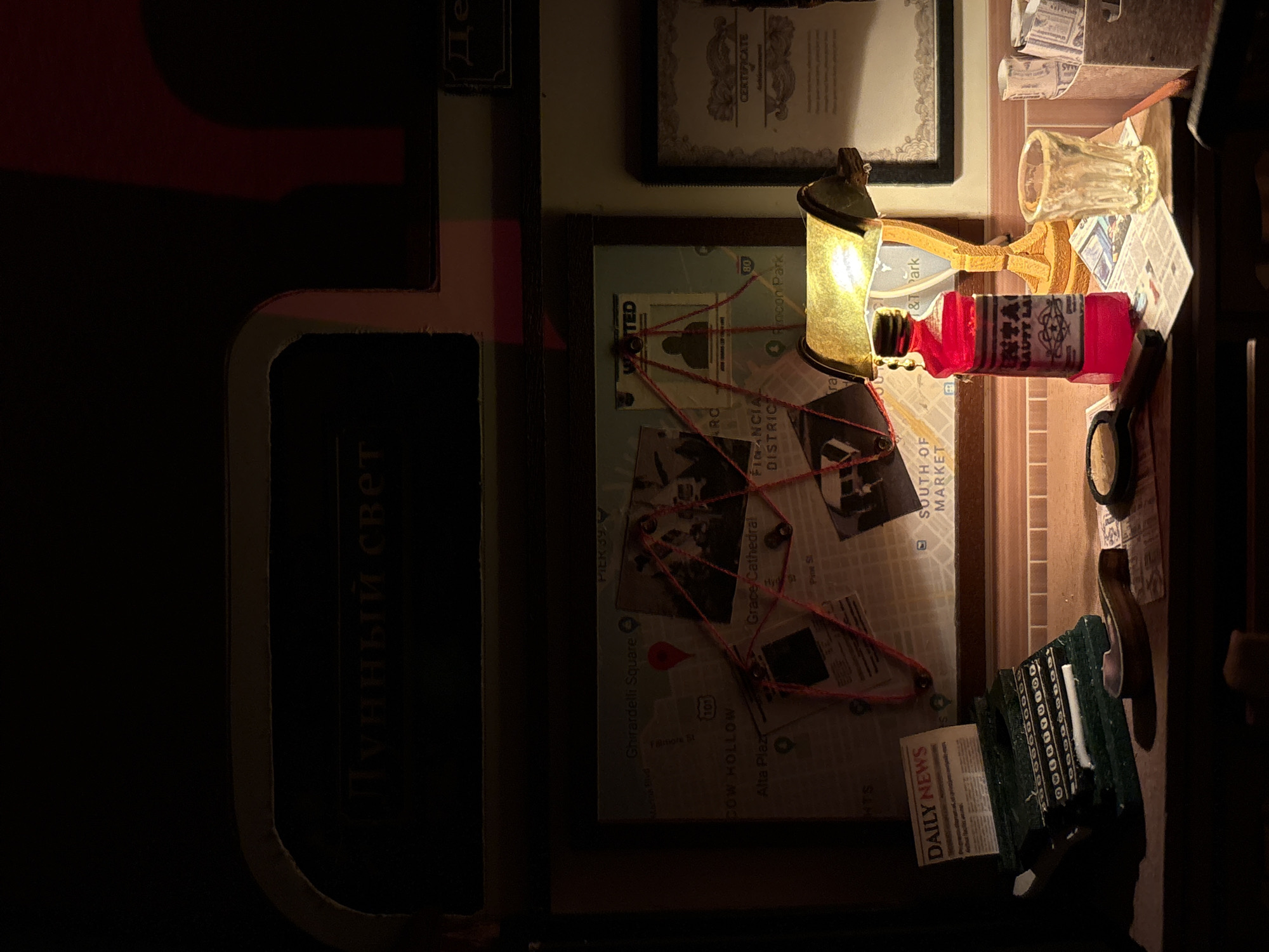 Cozy desk setup and detailed detective dioramas, Radkevshchina evening