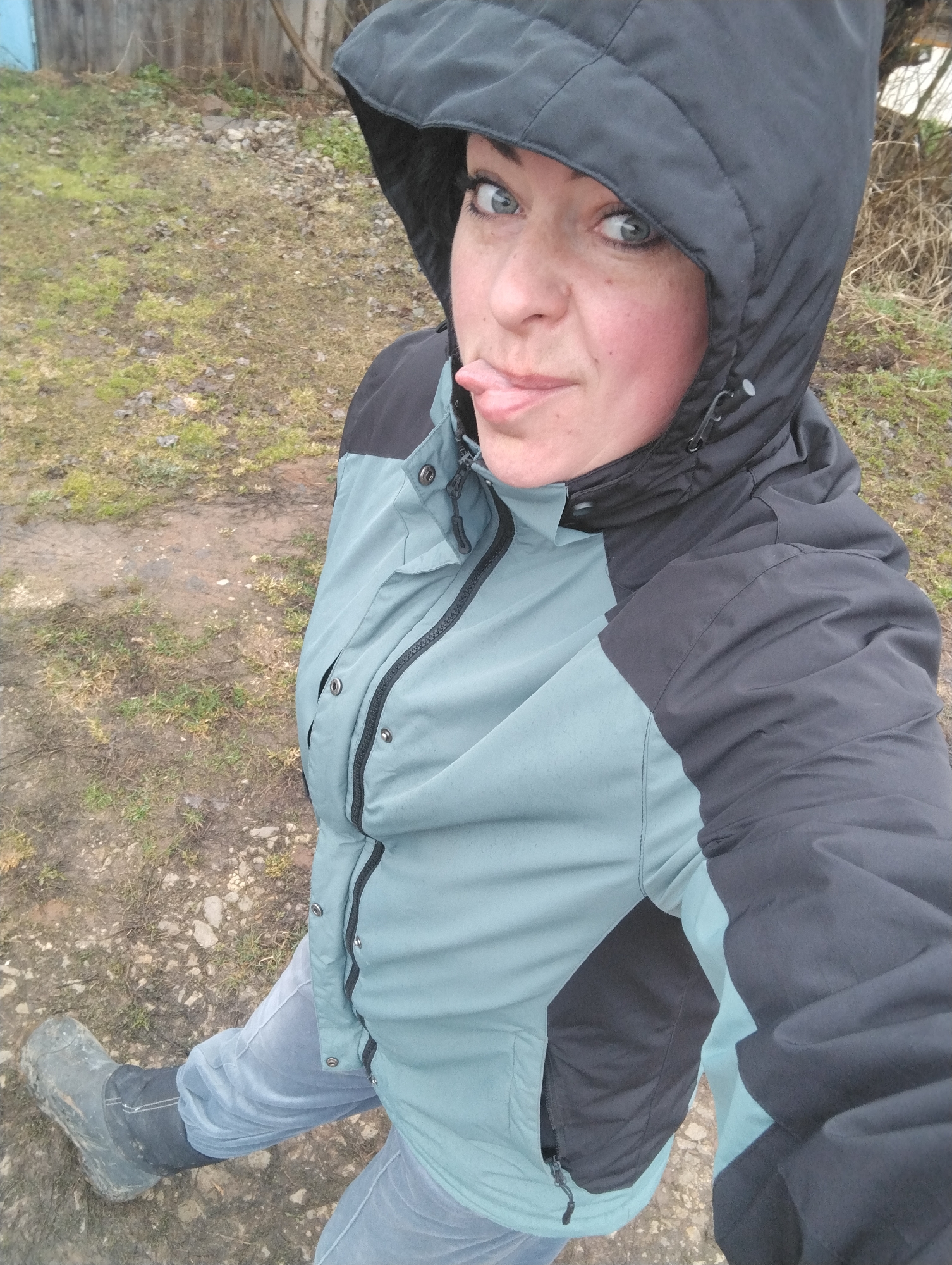 Woman takes outdoor selfie in Grishanki, Russia