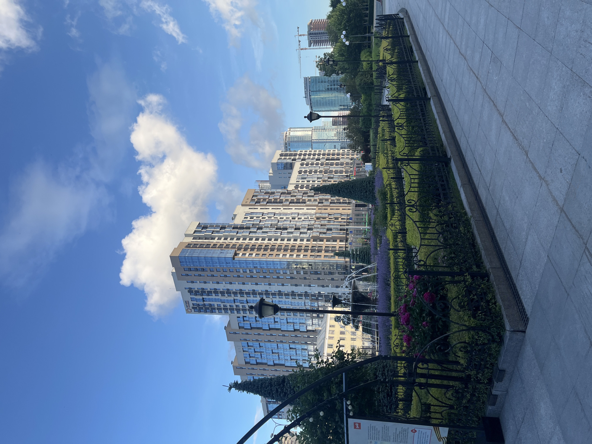Urban park stroll with gardens, architecture, and coffee break