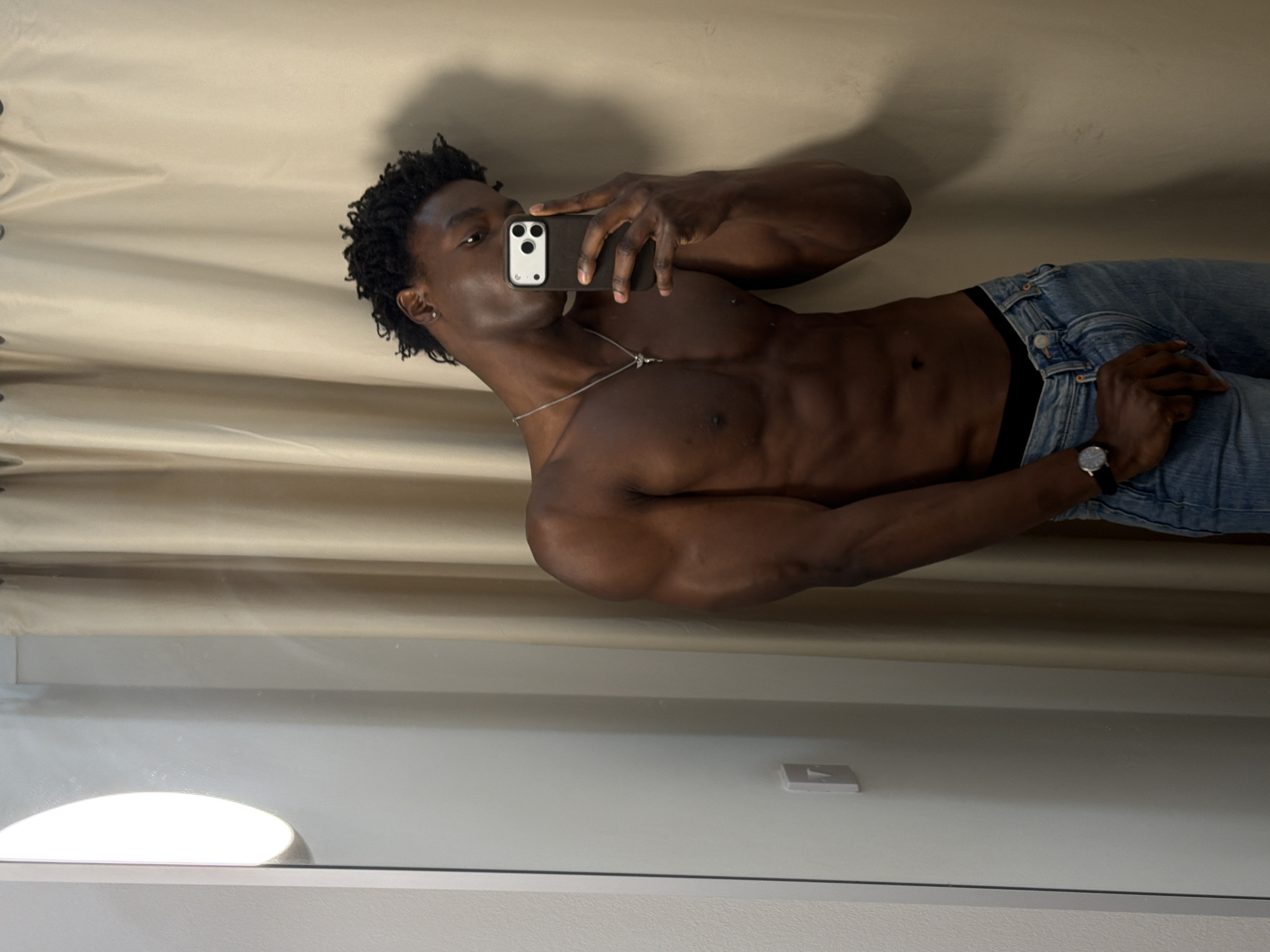 Person takes multiple mirror selfies in Manchester morning